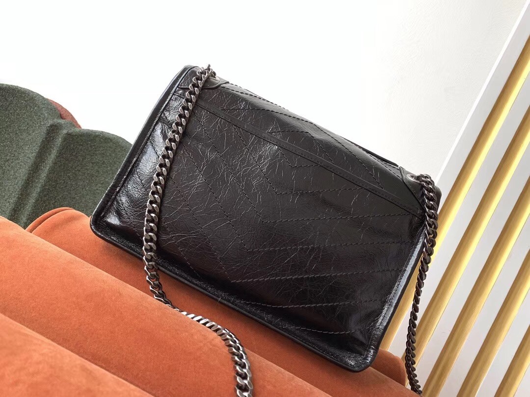 Sa**t Lau*nt medium niki bag in black crinkled leather