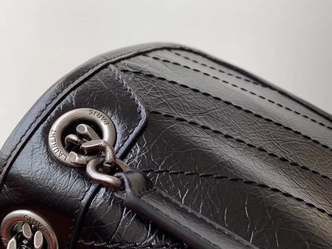 Sa**t Lau*nt medium niki bag in black crinkled leather