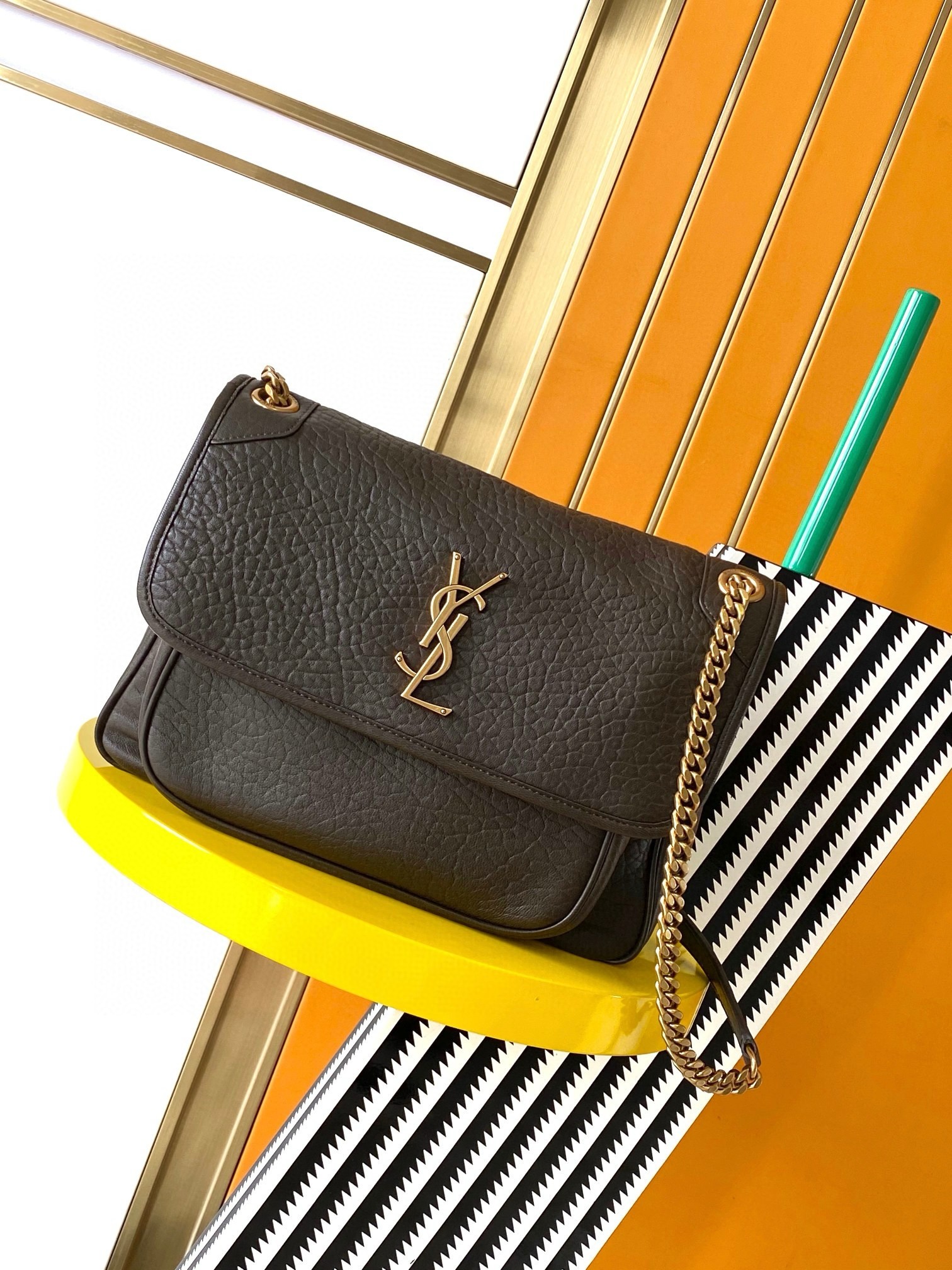 Sa**t Lau*nt niki medium chain bag in chocolate grained lambskin