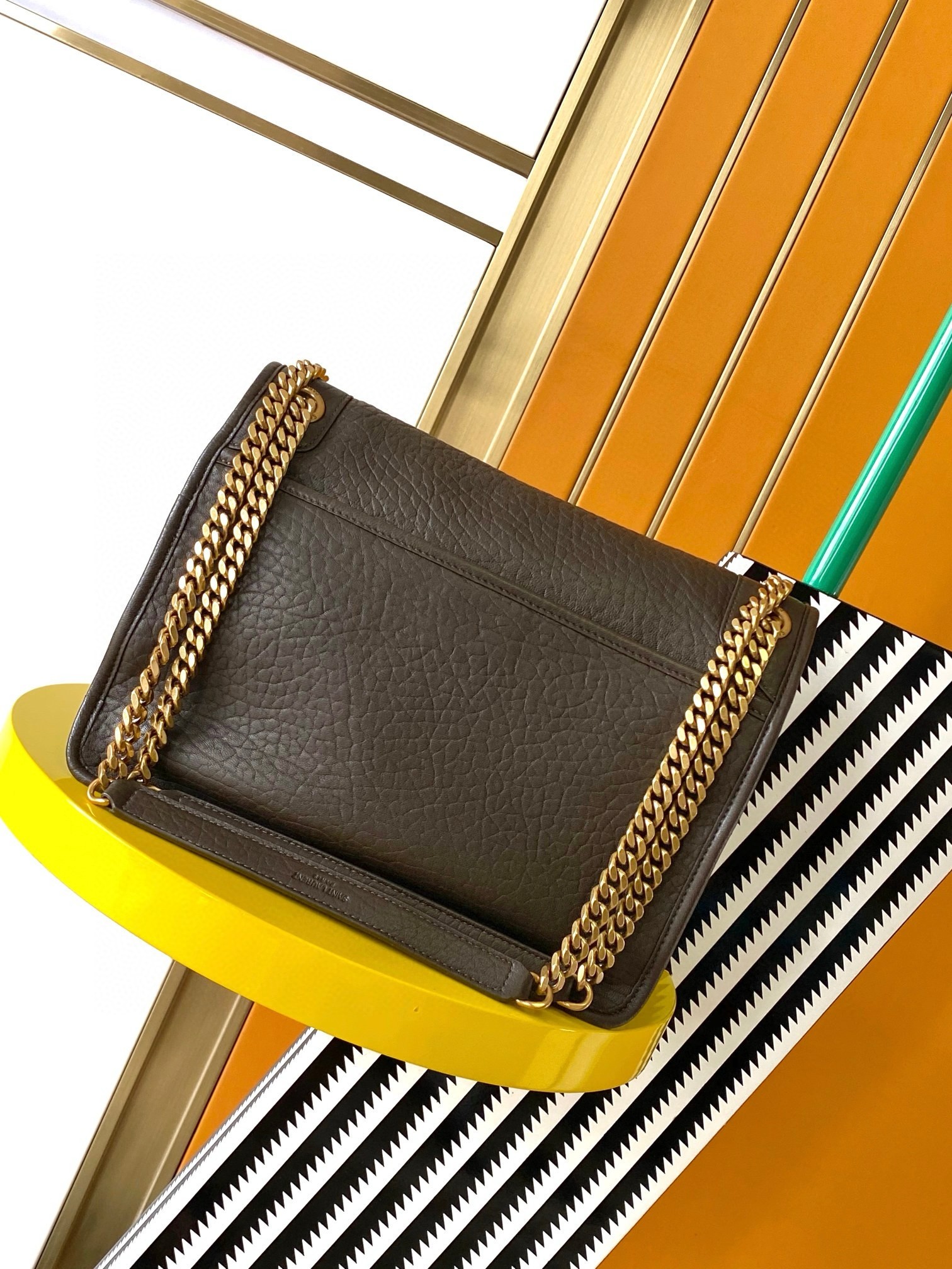 Sa**t Lau*nt niki medium chain bag in chocolate grained lambskin