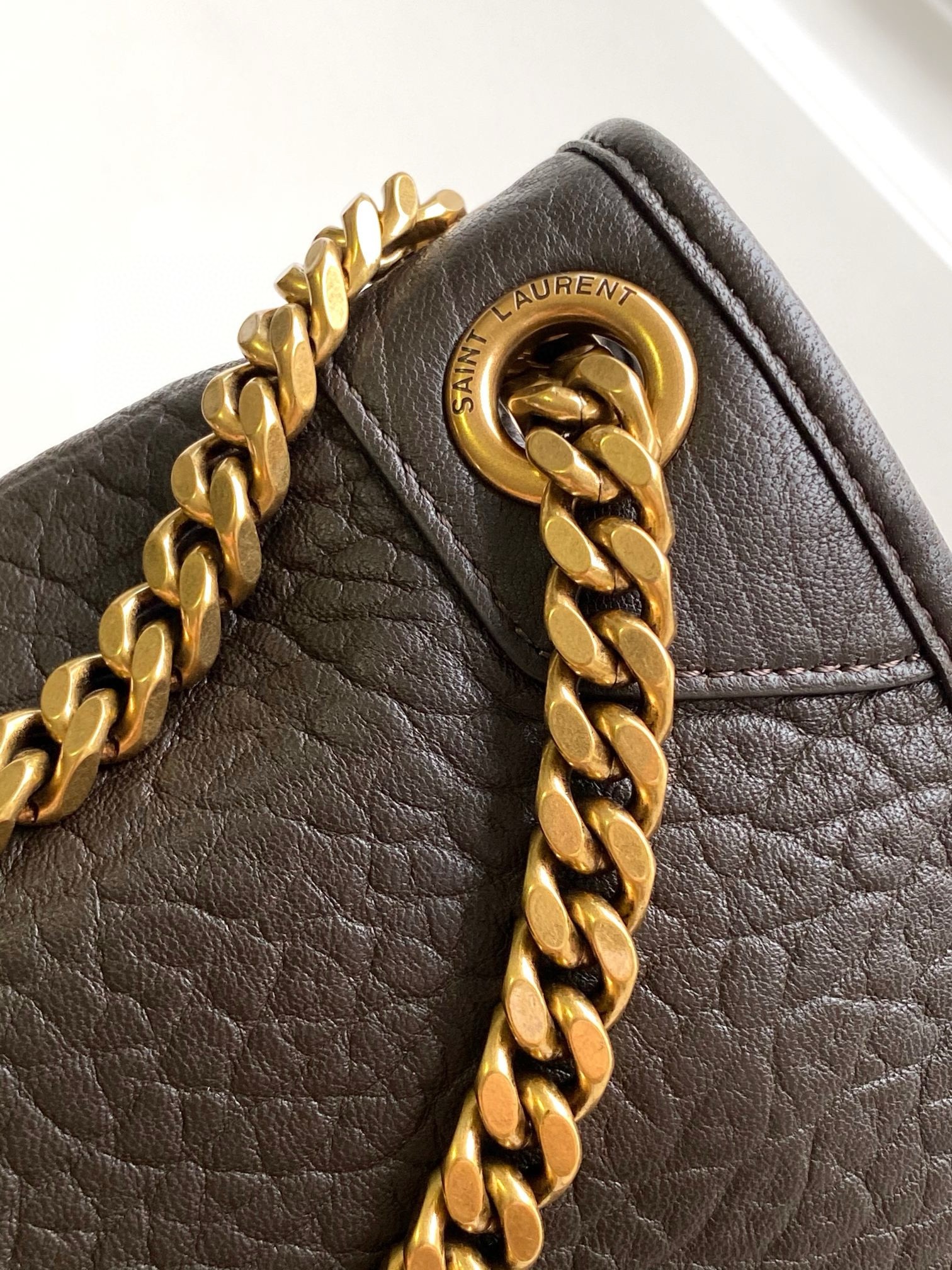 Sa**t Lau*nt niki medium chain bag in chocolate grained lambskin