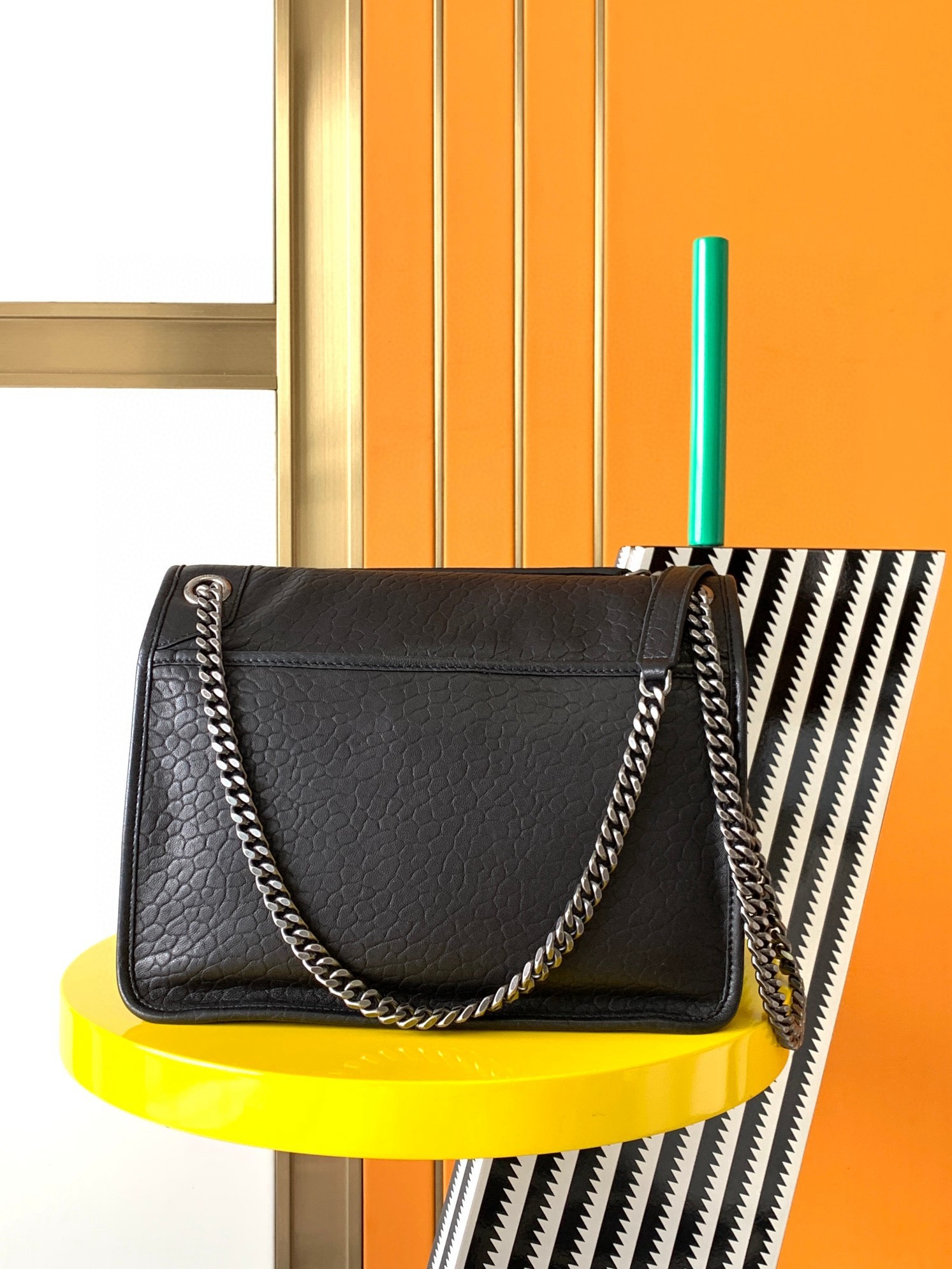 Sa**t Lau*nt niki medium chain bag in black grained lambskin