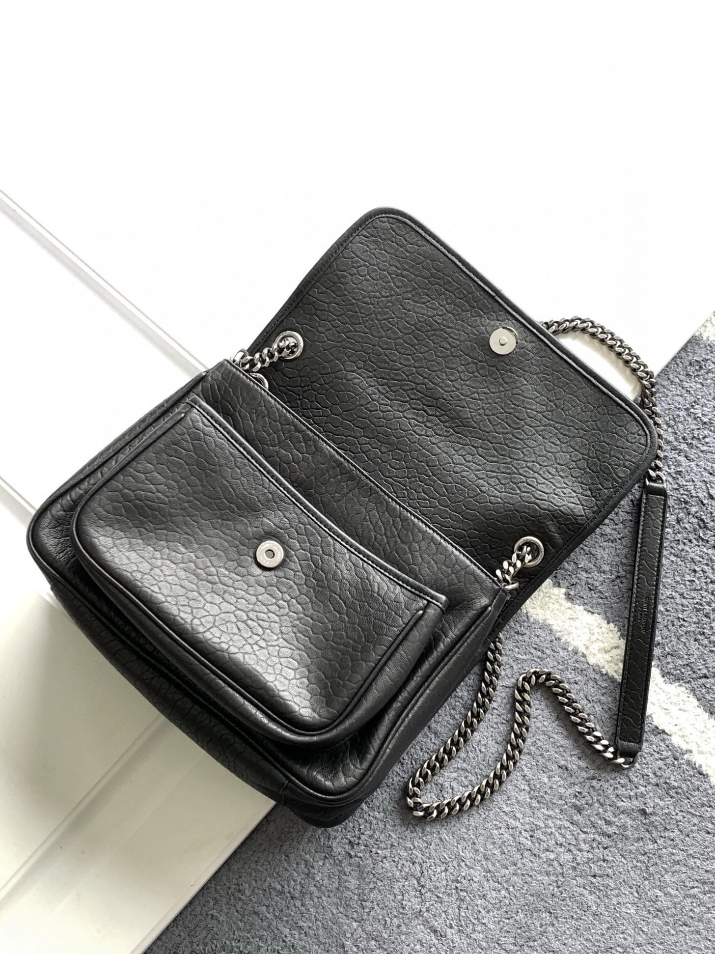 Sa**t Lau*nt niki medium chain bag in black grained lambskin