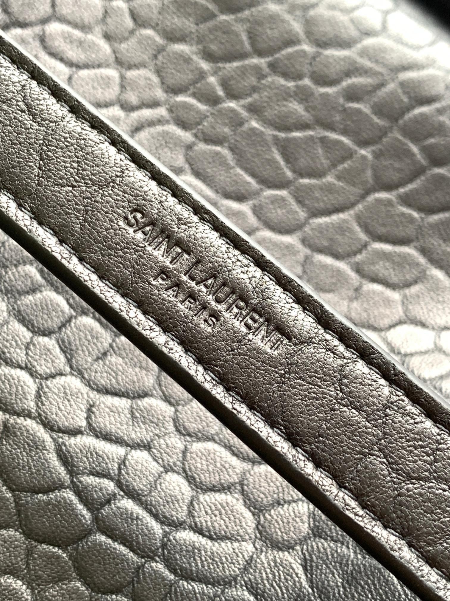 Sa**t Lau*nt niki medium chain bag in black grained lambskin