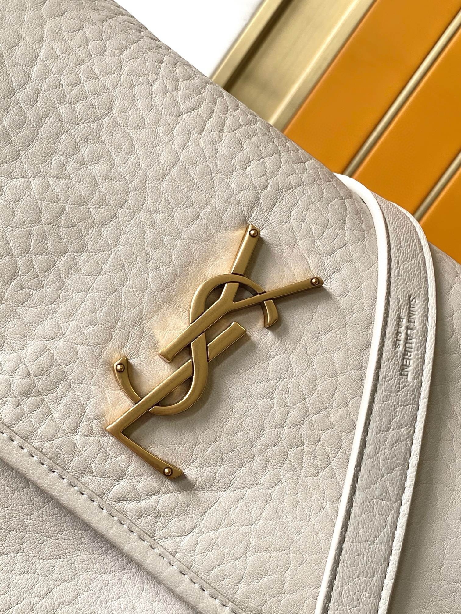 Sa**t Lau*nt niki medium chain bag in white grained lambskin