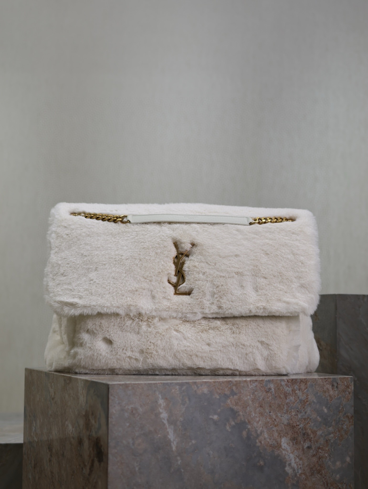 Sa**t Lau*nt niki oversized shoulder bag in white shearling