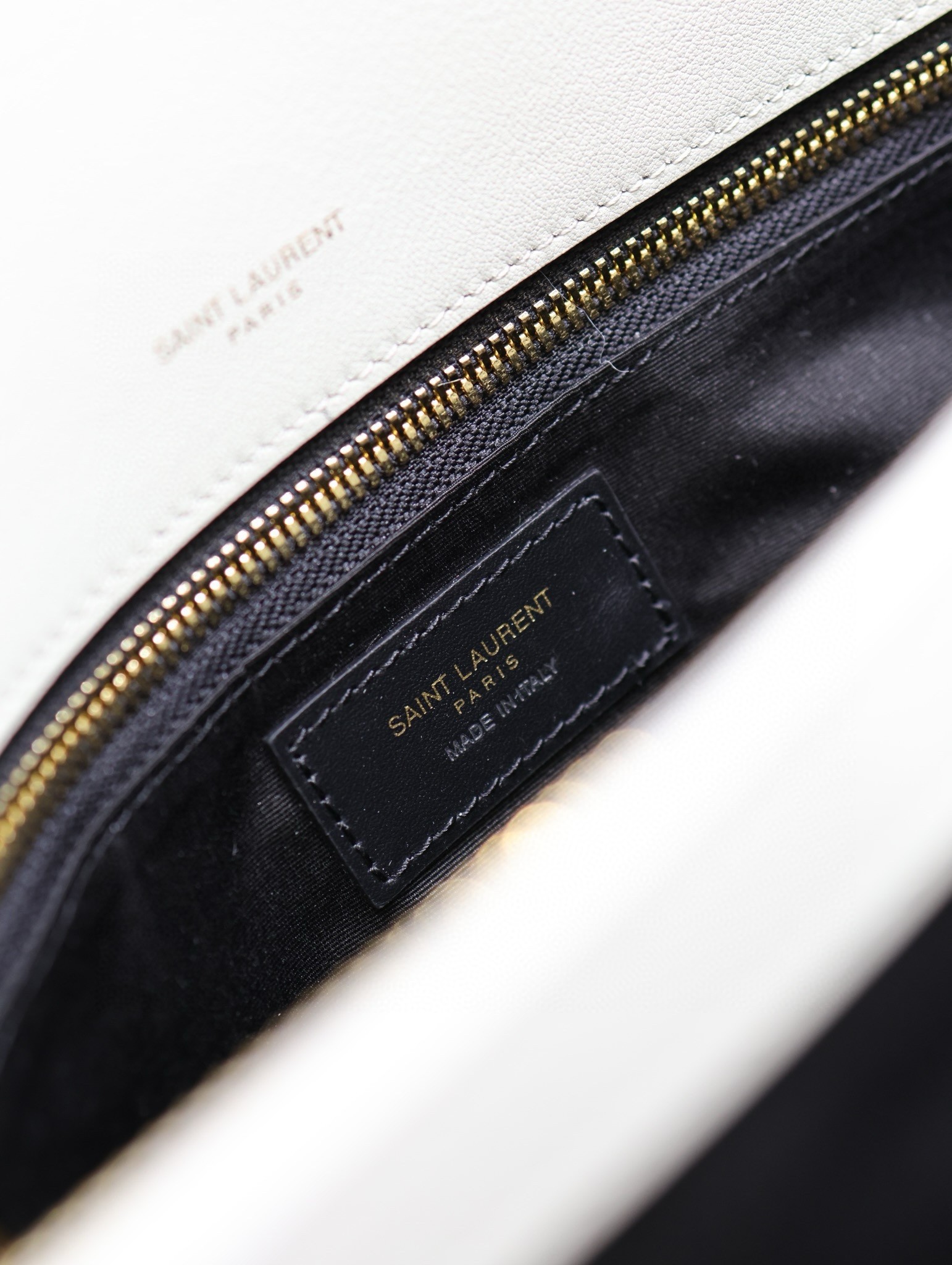 Sa**t Lau*nt niki oversized shoulder bag in white shearling