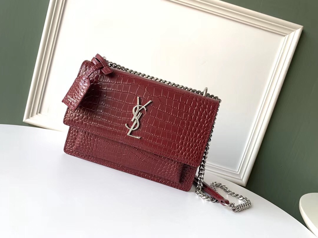 Sa**t Lau*nt sunset medium bag in bordeaux crocodile embossed leather