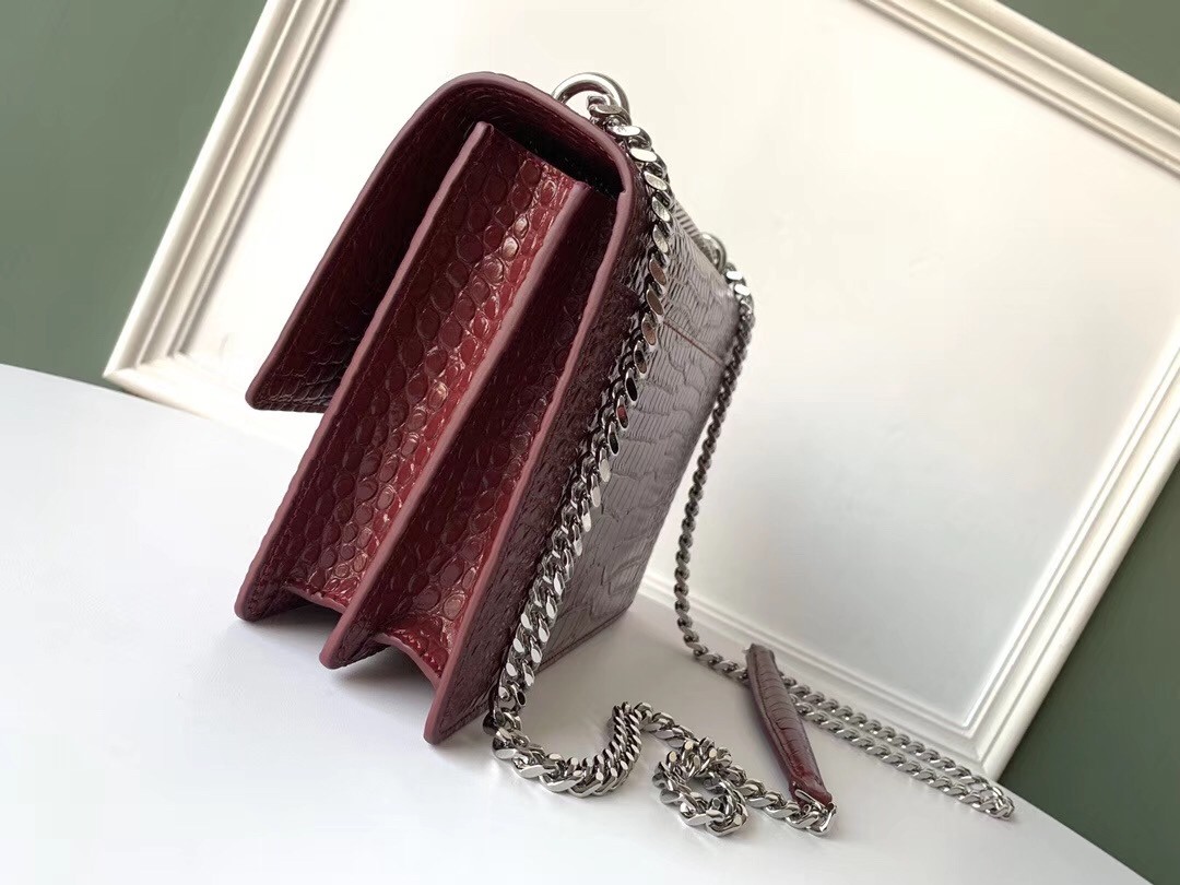 Sa**t Lau*nt sunset medium bag in bordeaux crocodile embossed leather