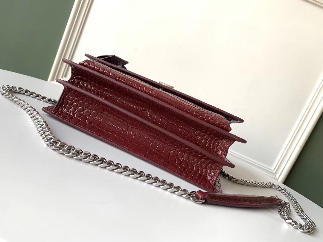 Sa**t Lau*nt sunset medium bag in bordeaux crocodile embossed leather