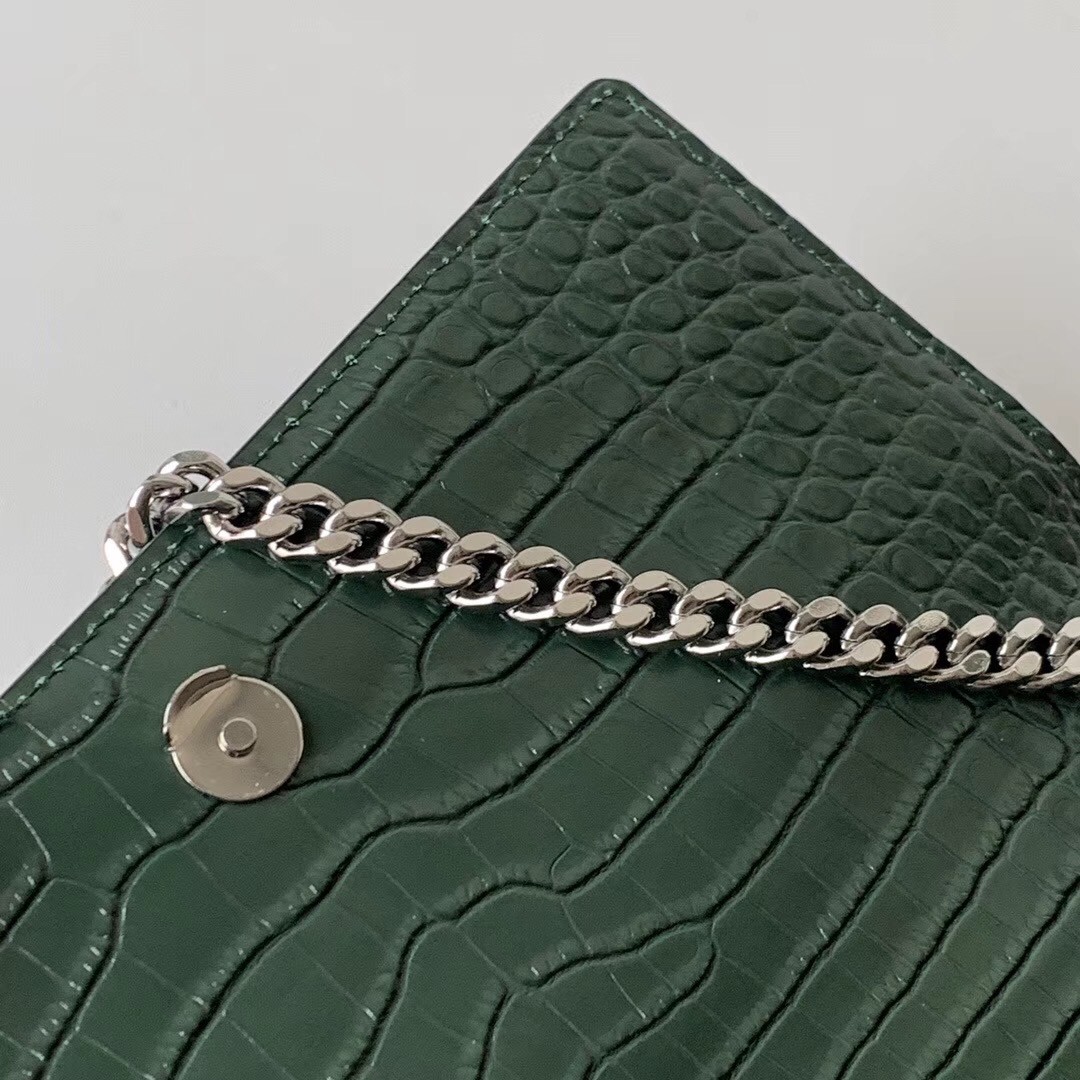 Sa**t Lau*nt sunset medium bag in green crocodile embossed leather