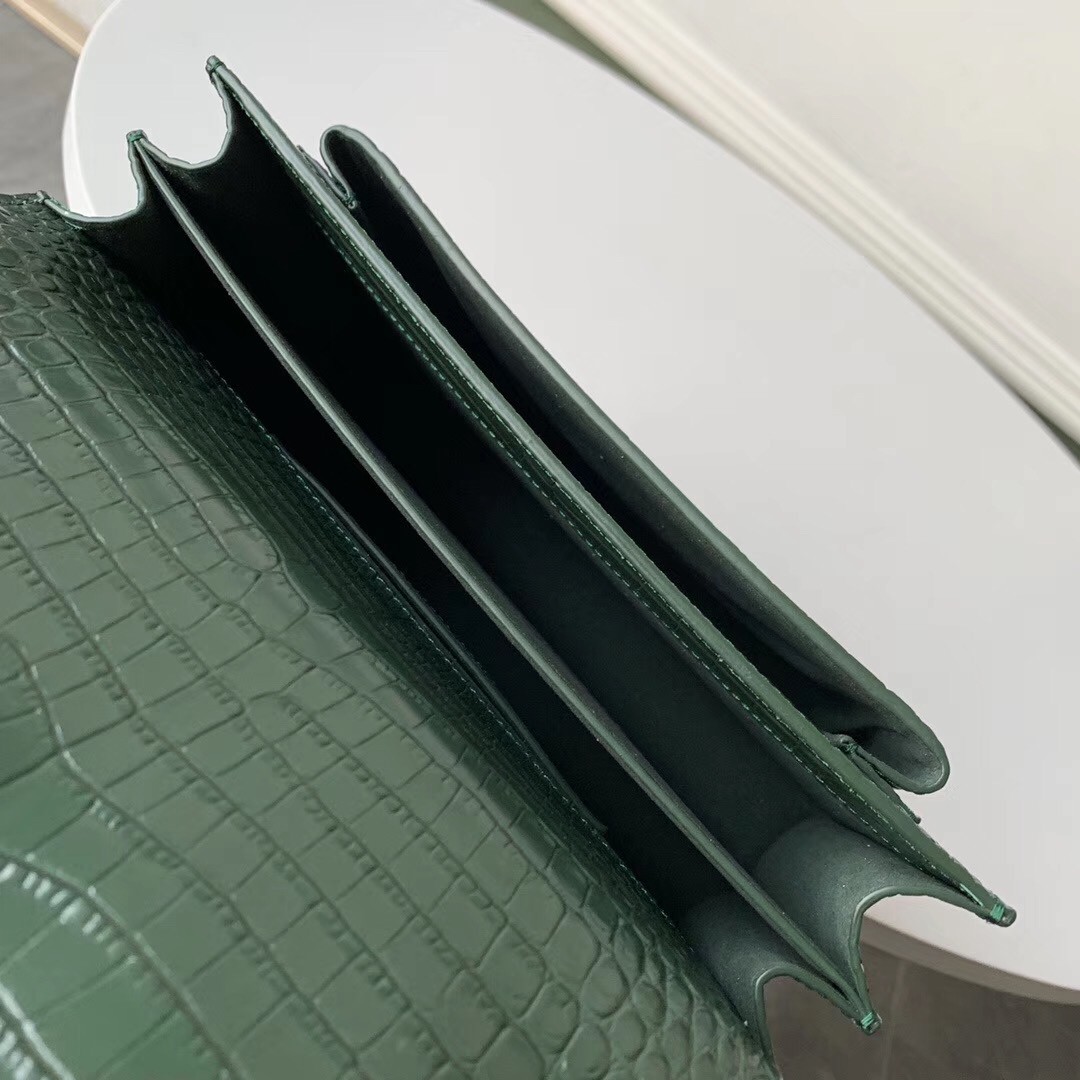 Sa**t Lau*nt sunset medium bag in green crocodile embossed leather