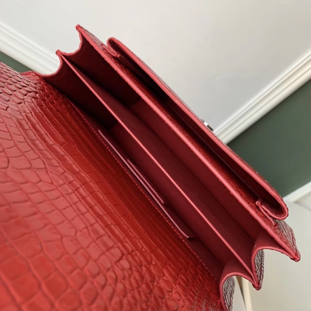 Sa**t Lau*nt sunset medium bag in red crocodile embossed leather