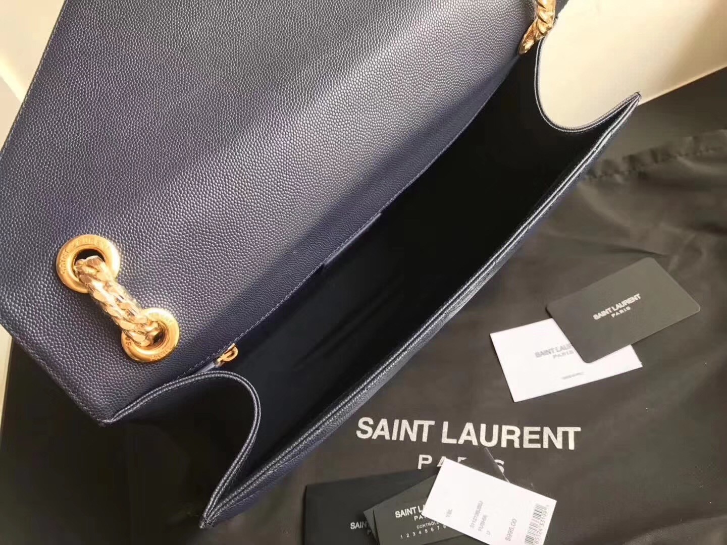 Sa**t Lau*nt envelope large bag in blue quilted leather