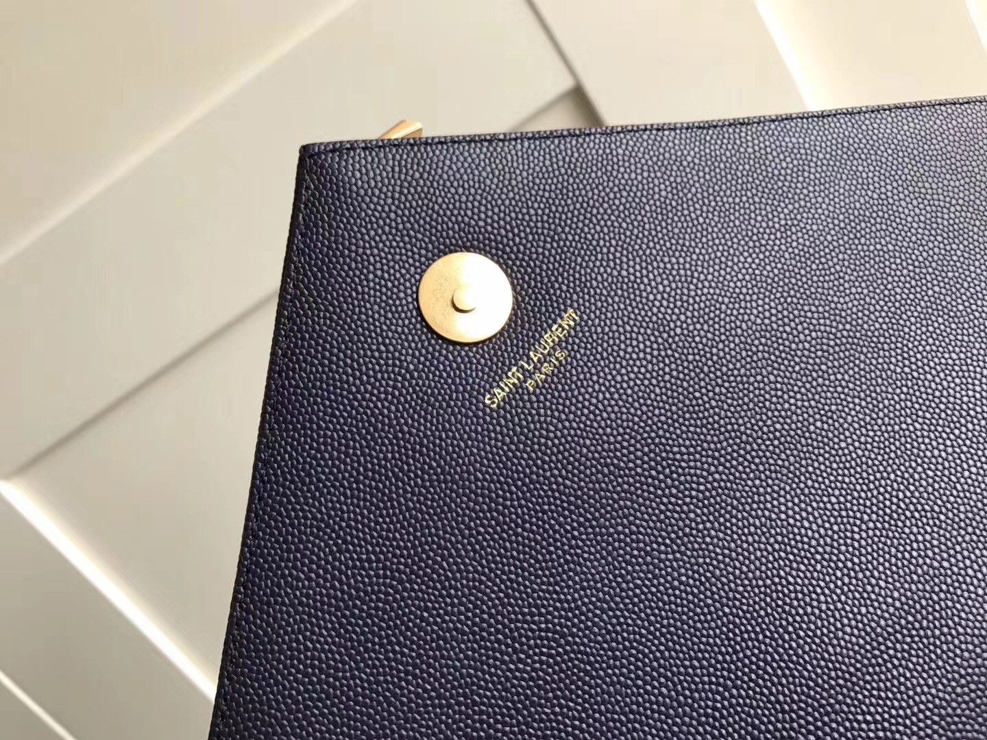 Sa**t Lau*nt envelope large bag in blue quilted leather