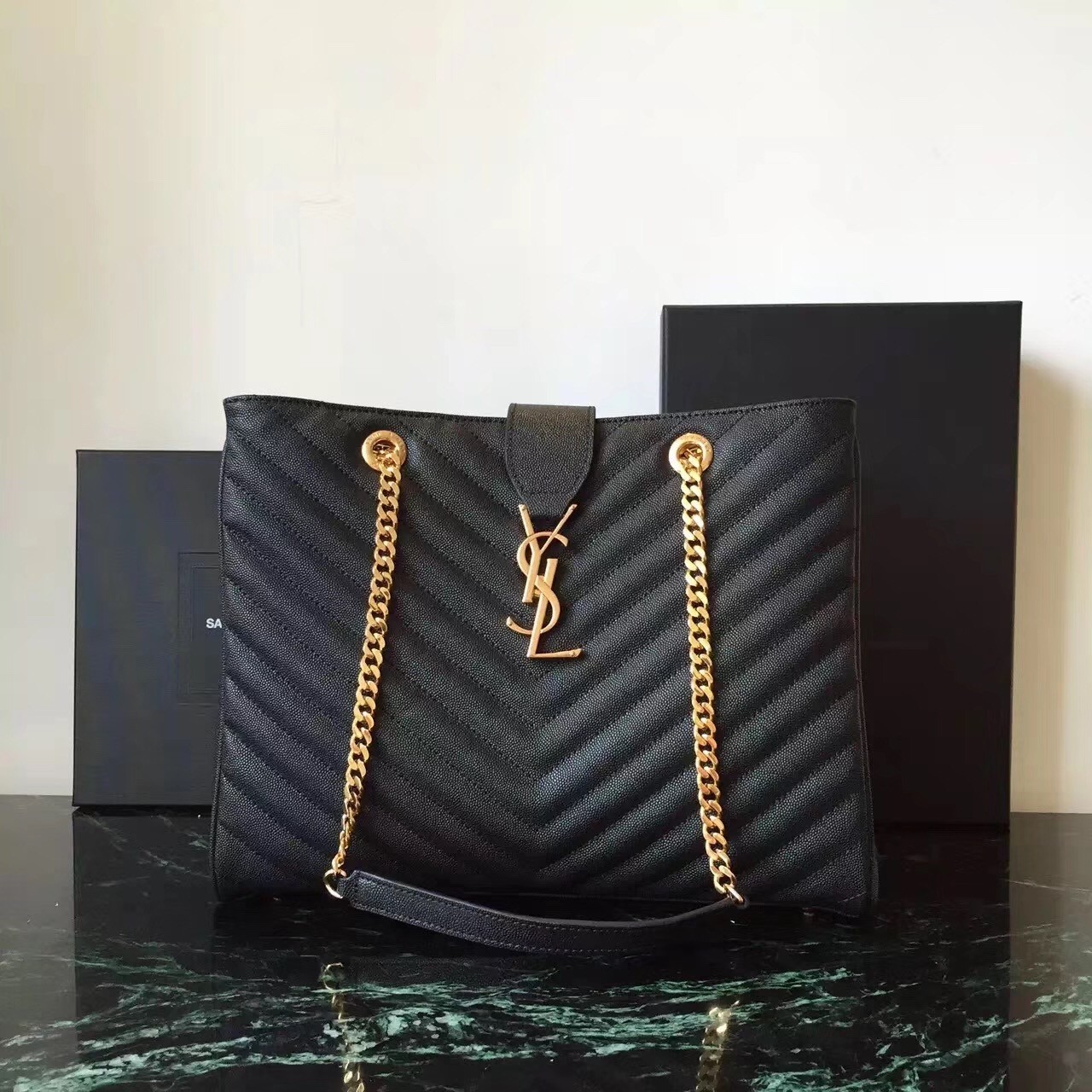 Sa**t Lau*nt monogram tote bag in black grained leather