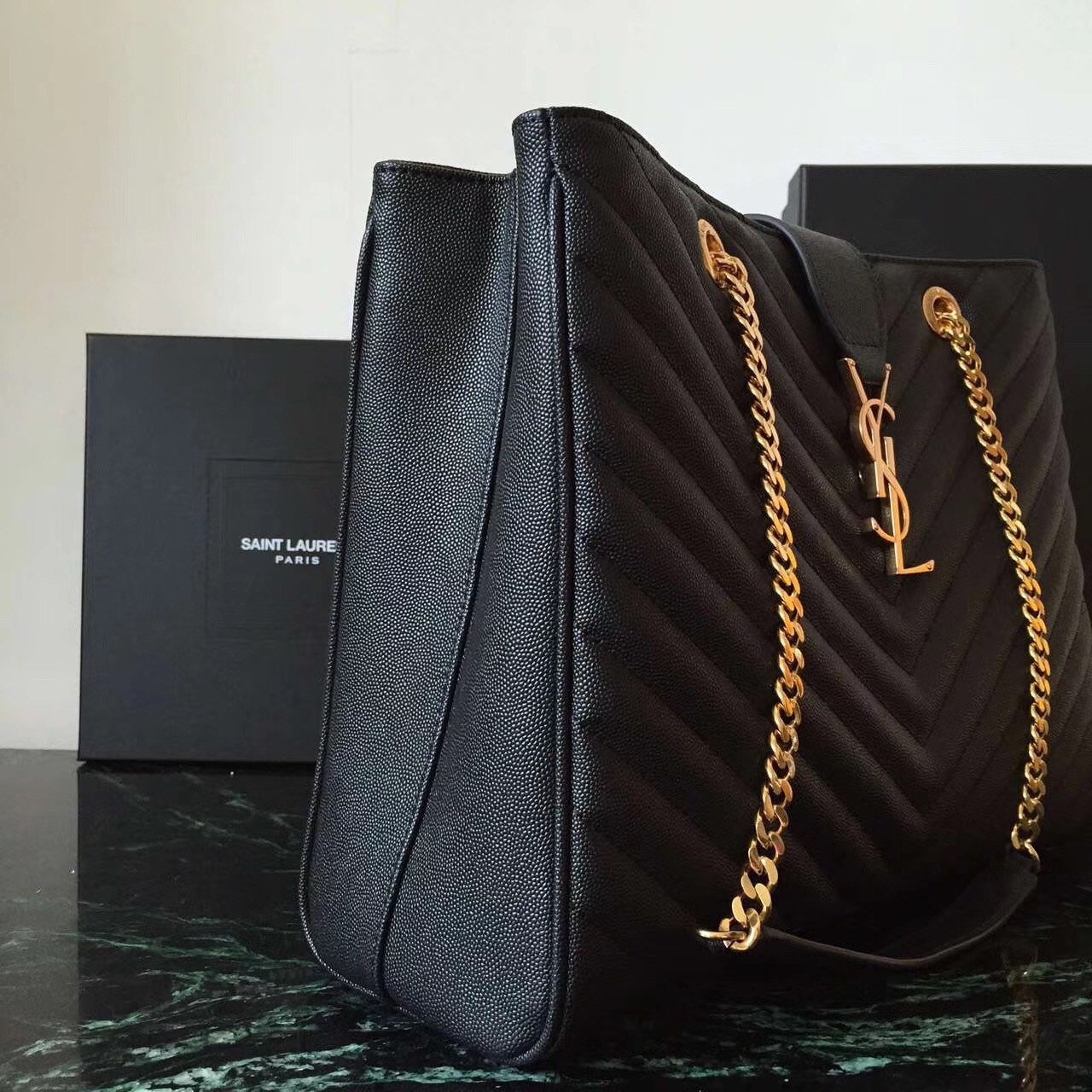 Sa**t Lau*nt monogram tote bag in black grained leather