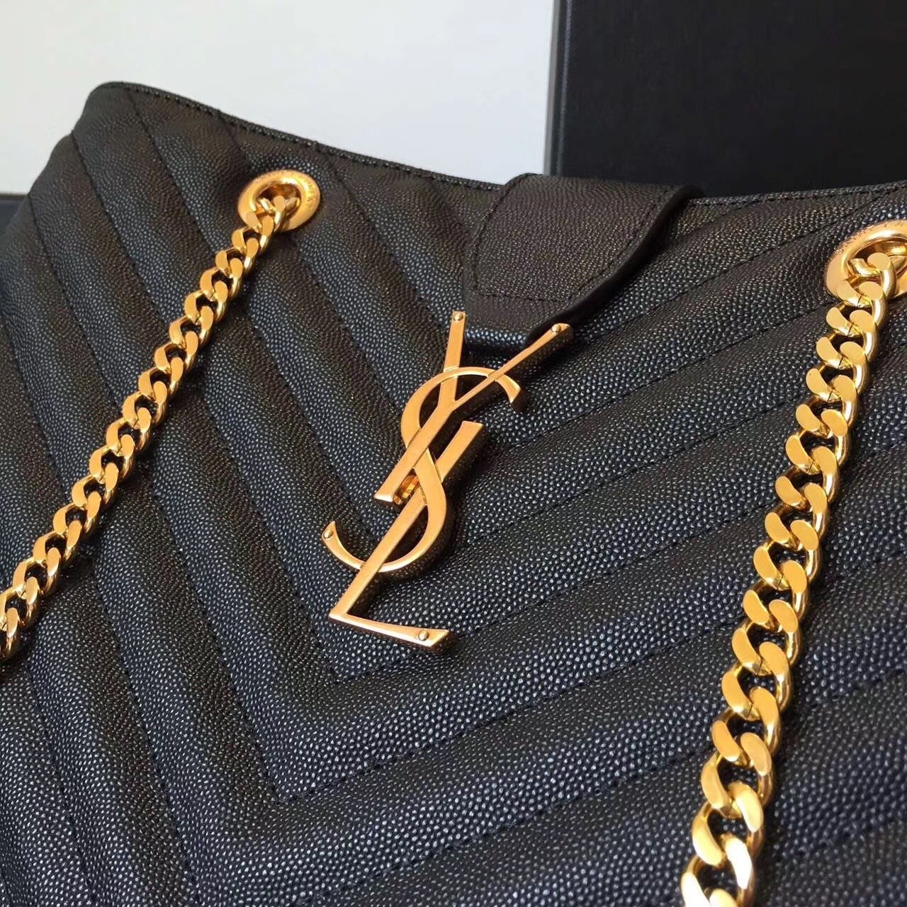 Sa**t Lau*nt monogram tote bag in black grained leather