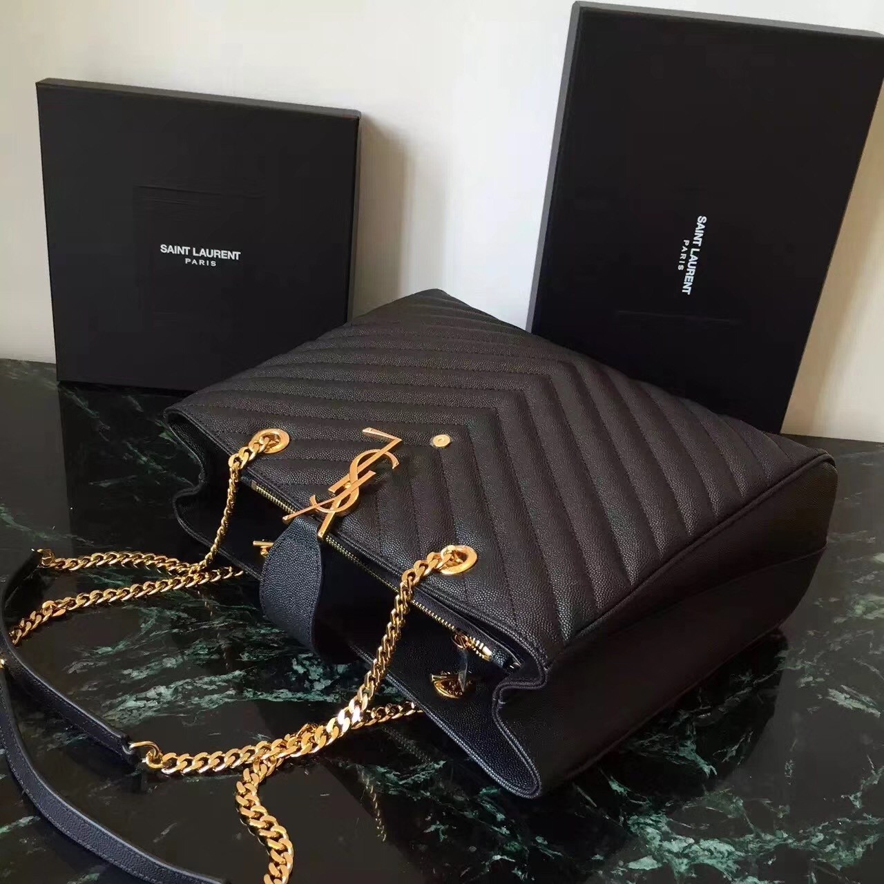 Sa**t Lau*nt monogram tote bag in black grained leather