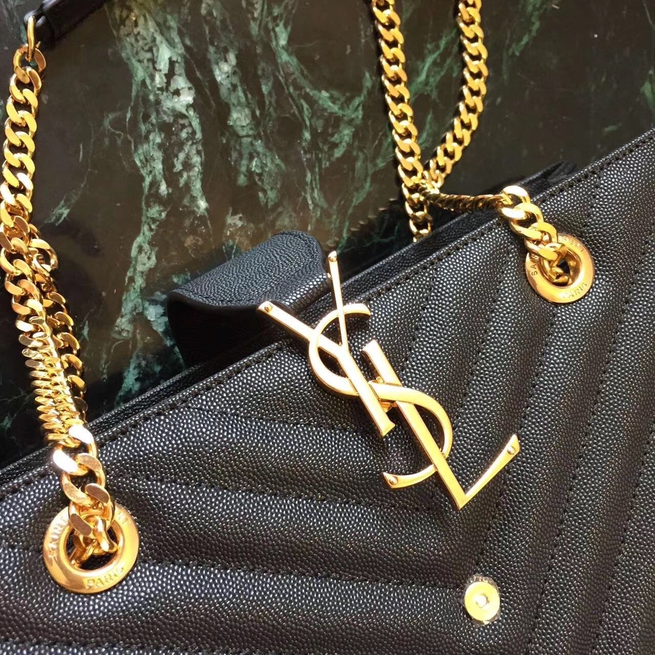 Sa**t Lau*nt monogram tote bag in black grained leather