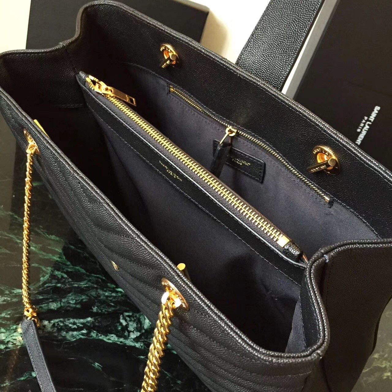 Sa**t Lau*nt monogram tote bag in black grained leather