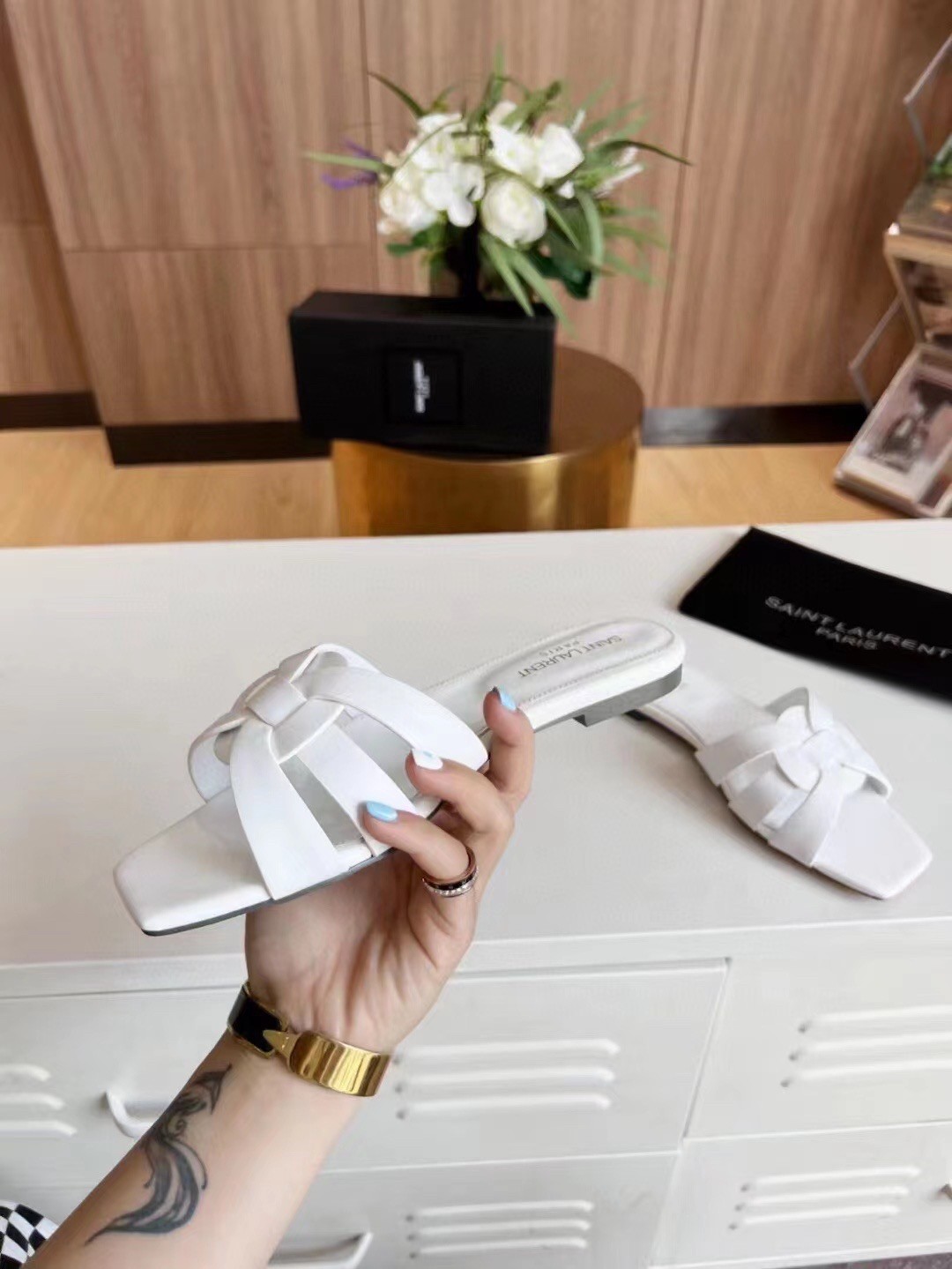 Sa**t Lau*nt tribute slides in white calfskin