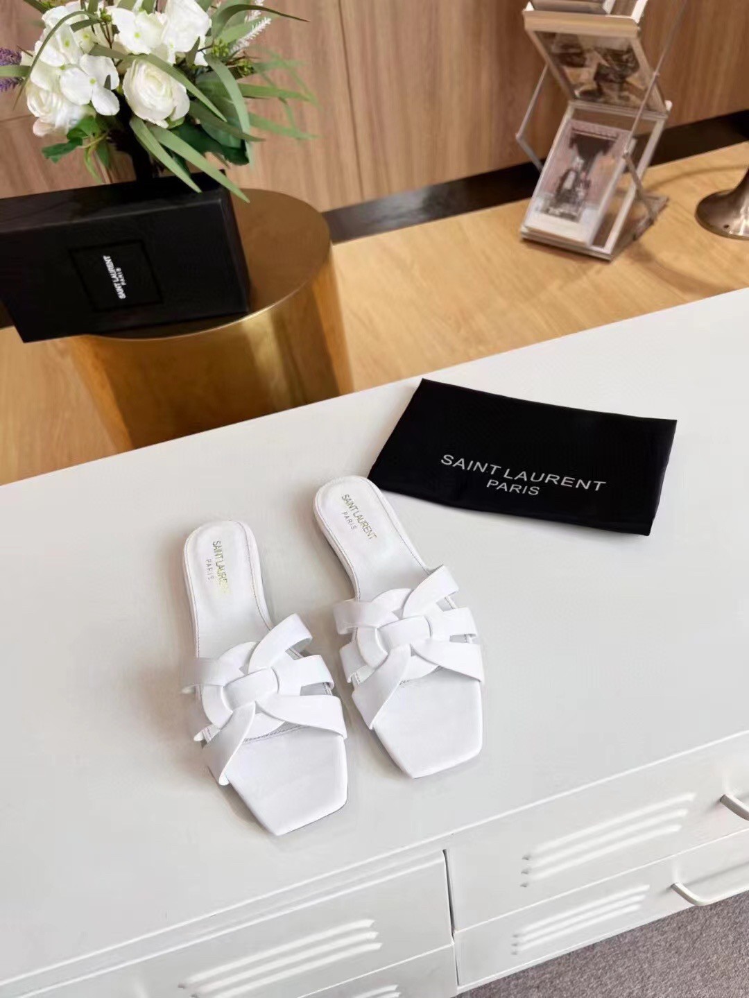 Sa**t Lau*nt tribute slides in white calfskin