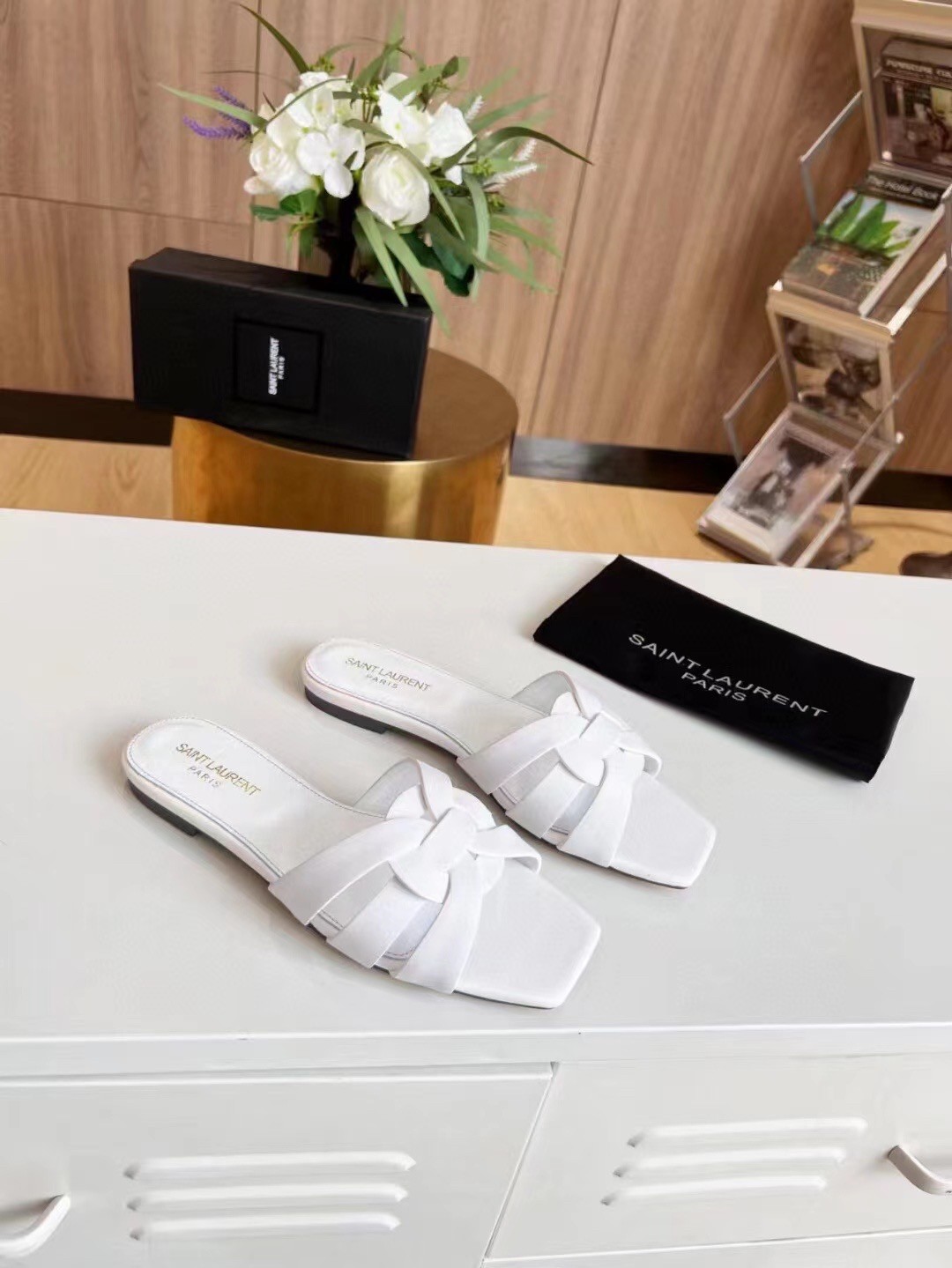 Sa**t Lau*nt tribute slides in white calfskin