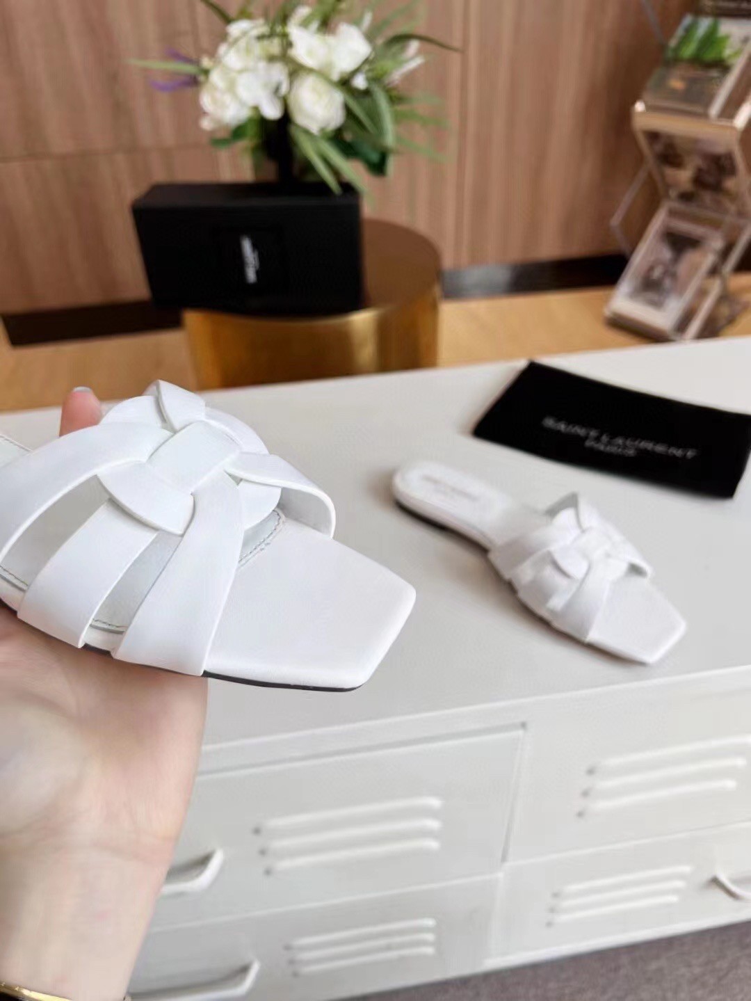 Sa**t Lau*nt tribute slides in white calfskin