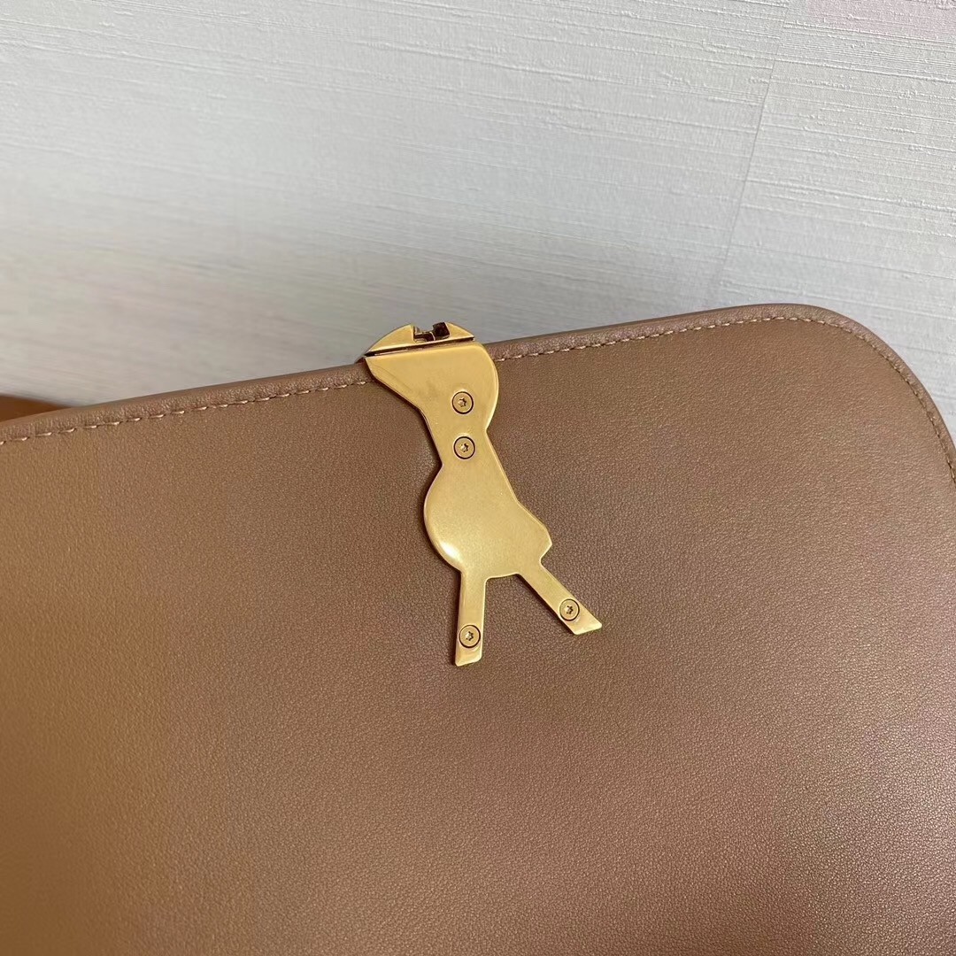 Sa**t Lau*nt solferino medium soft bag in brown suede