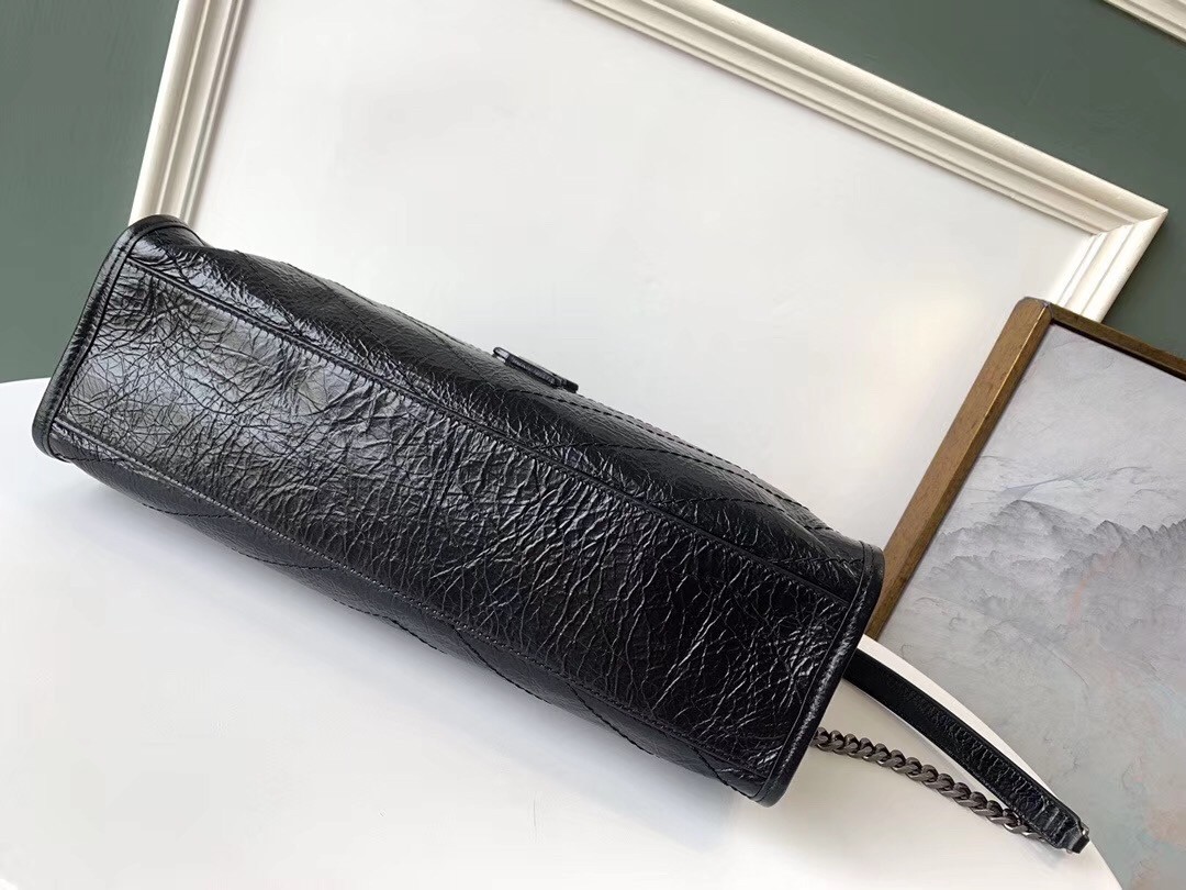 Sa**t Lau*nt medium niki shopping bag in black leather