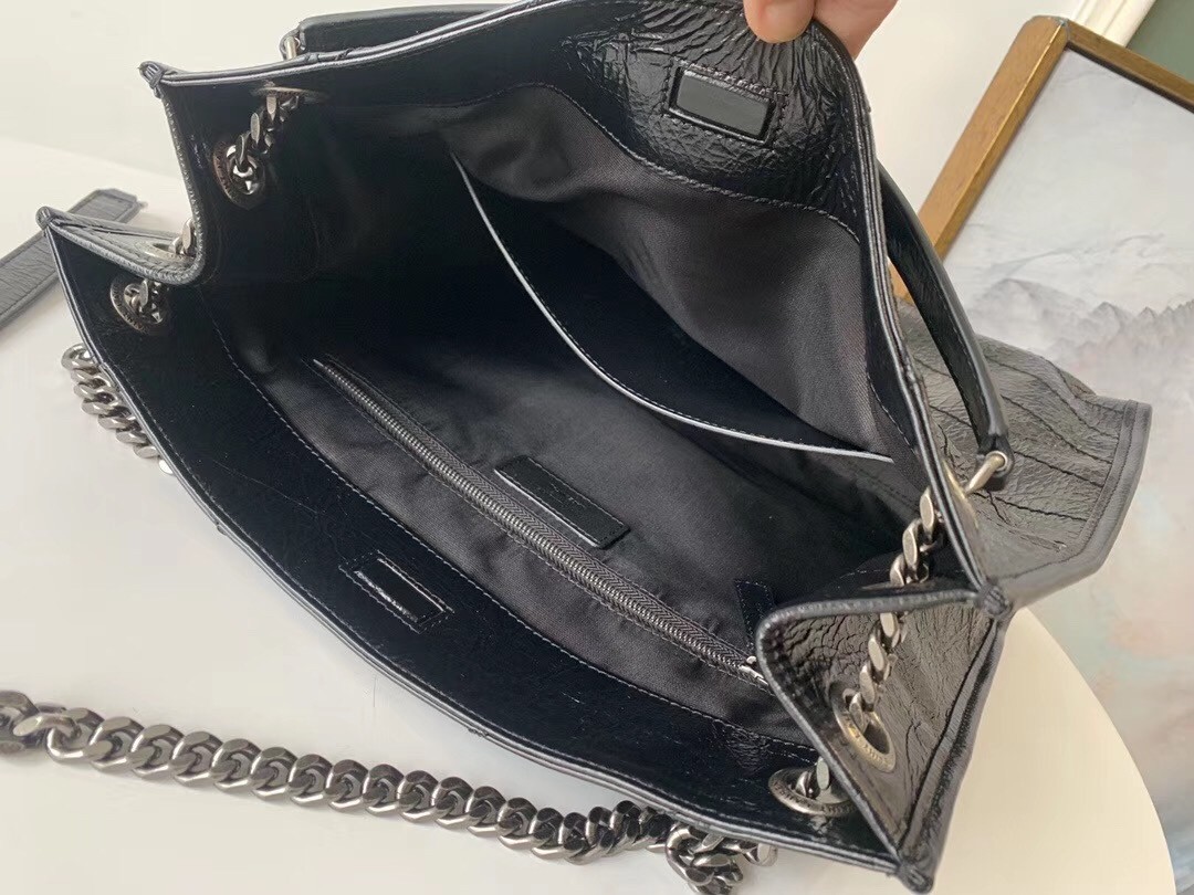 Sa**t Lau*nt medium niki shopping bag in black leather