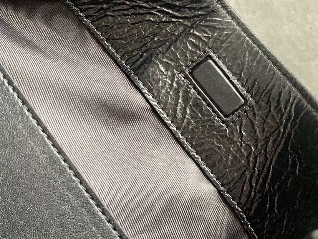 Sa**t Lau*nt medium niki shopping bag in black leather