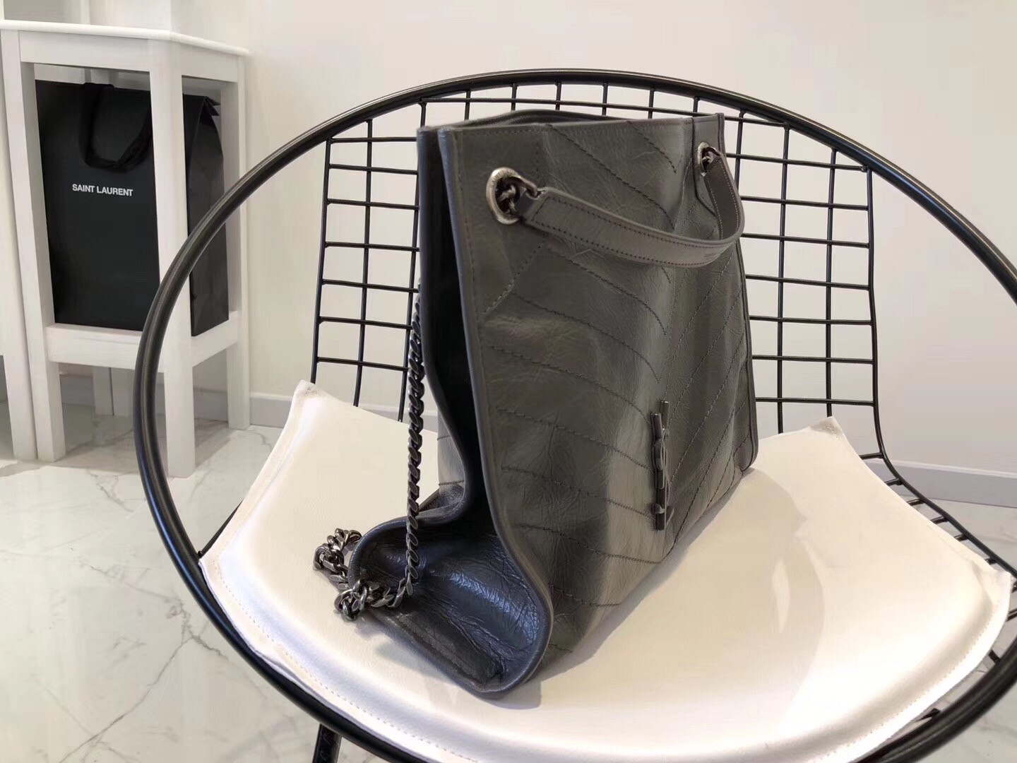 Sa**t Lau*nt medium niki shopping bag in storm leather