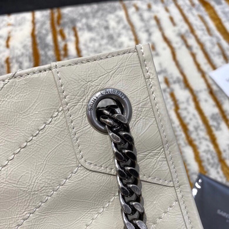Sa**t Lau*nt medium niki shopping bag in white leather