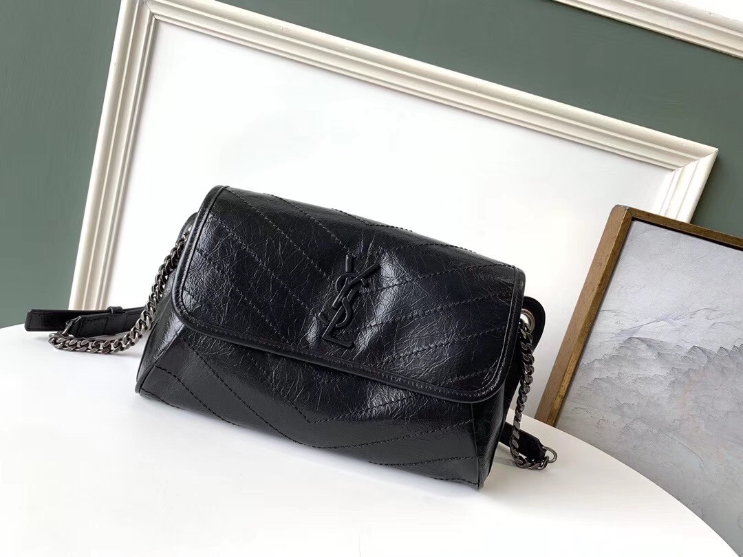 Sa**t Lau*nt niki body bag in black crinkled vintage leather