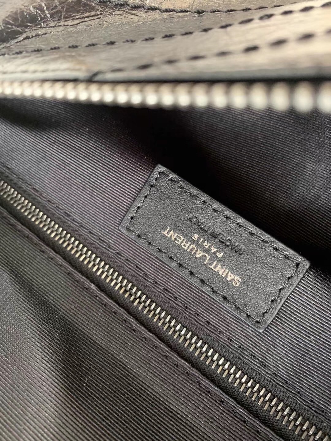 Sa**t Lau*nt niki body bag in black crinkled vintage leather
