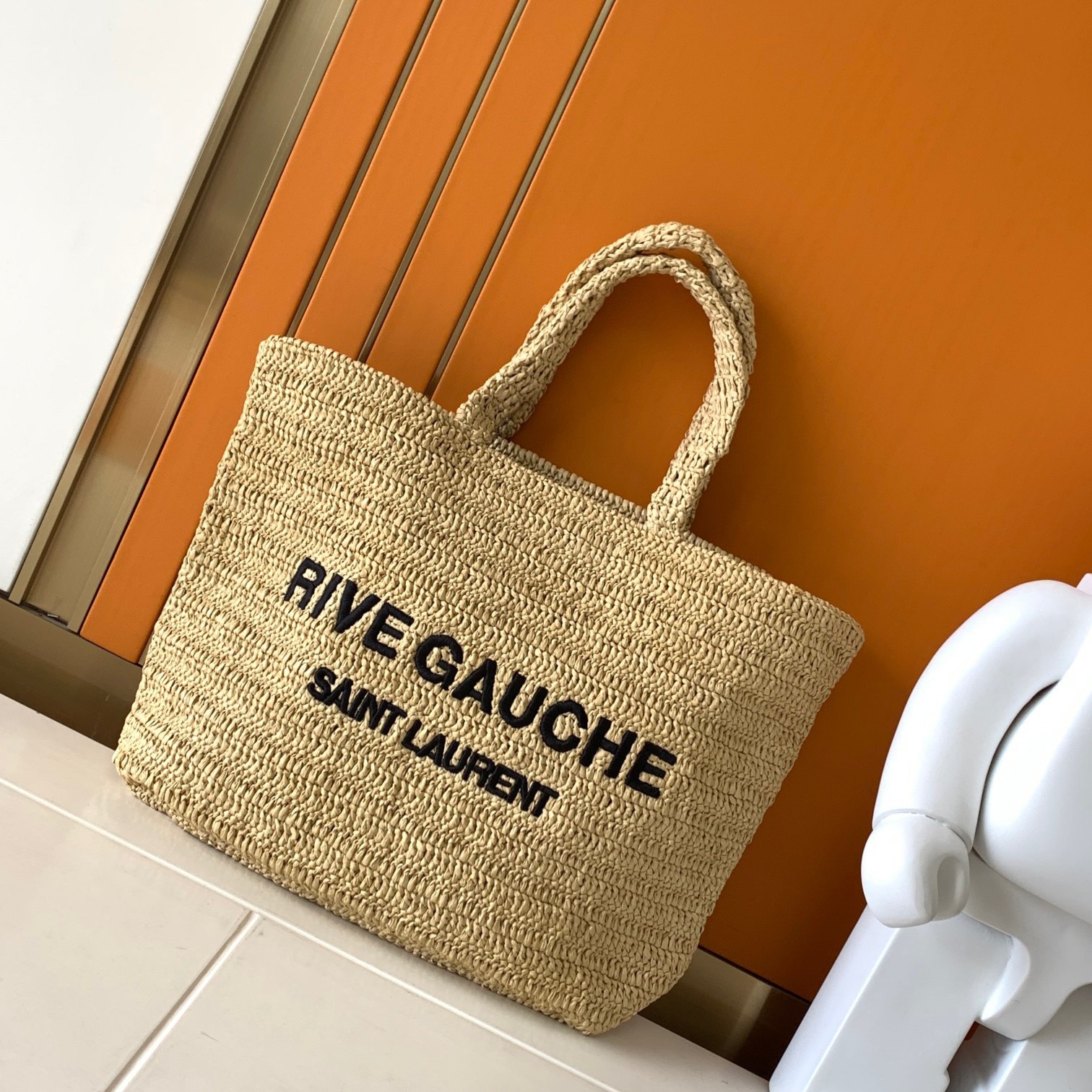 Sa**t Lau*nt rive gauche tote bag in beige raffia crochet