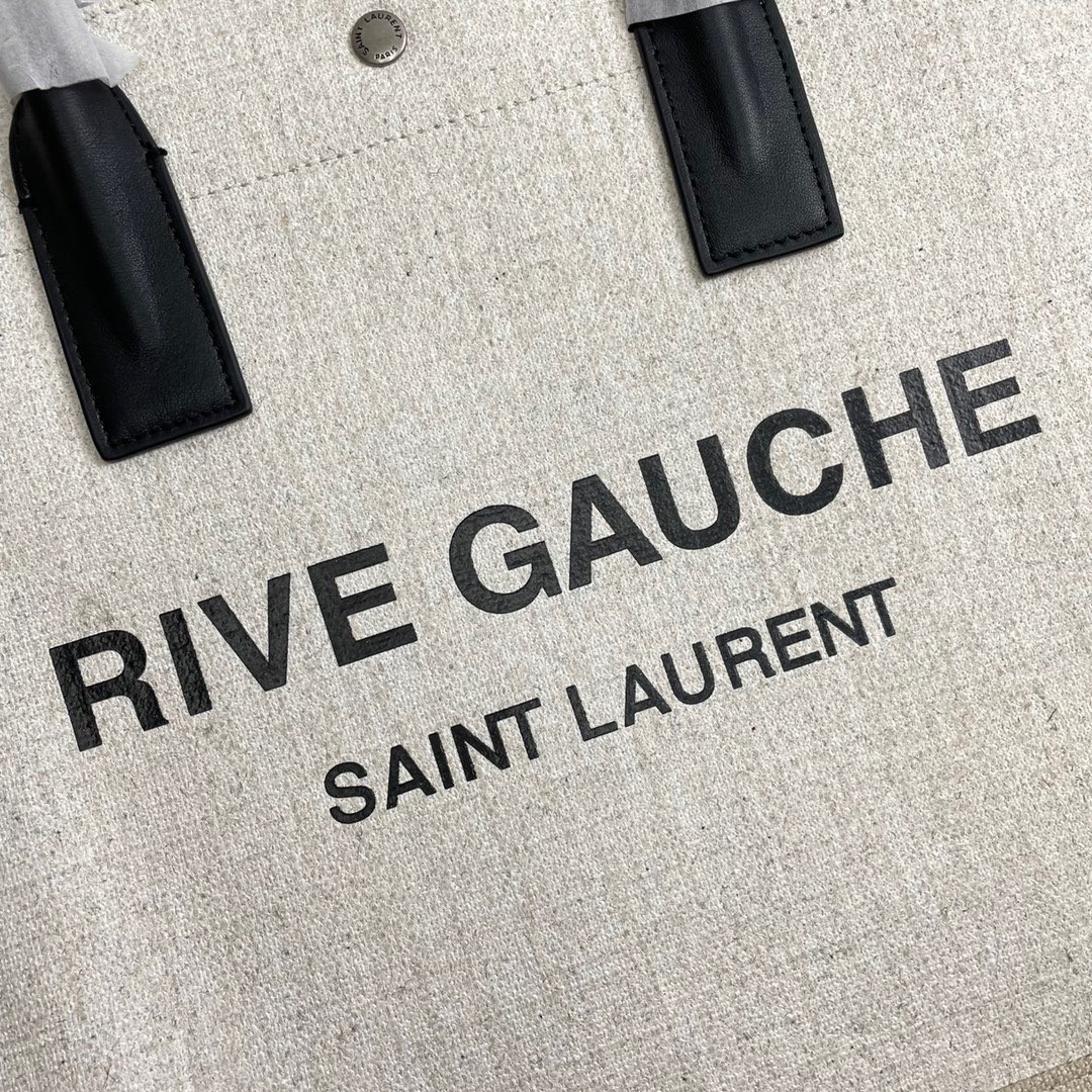 Sa**t Lau*nt rive gauche small tote bag in white linen and leather