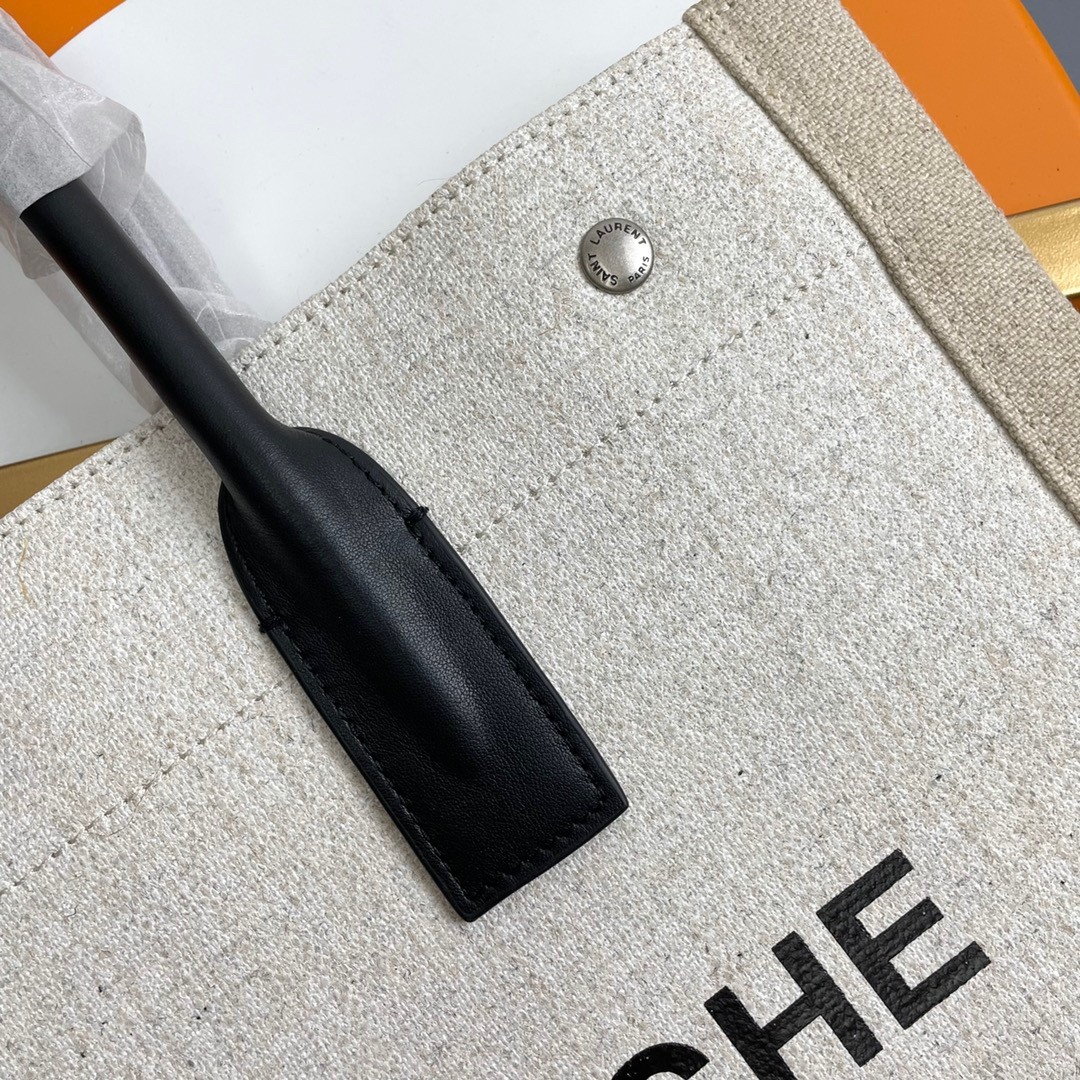 Sa**t Lau*nt rive gauche small tote bag in white linen and leather