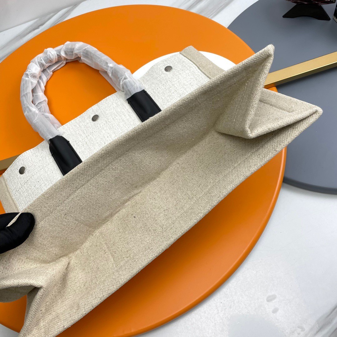 Sa**t Lau*nt rive gauche small tote bag in white linen and leather