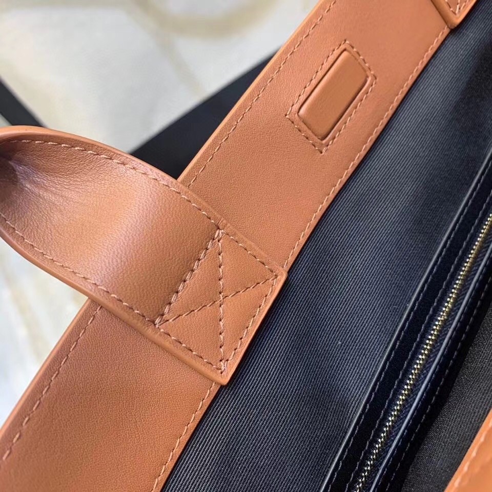 Sa**t Lau*nt tag shopping bag in canvas and brown leather