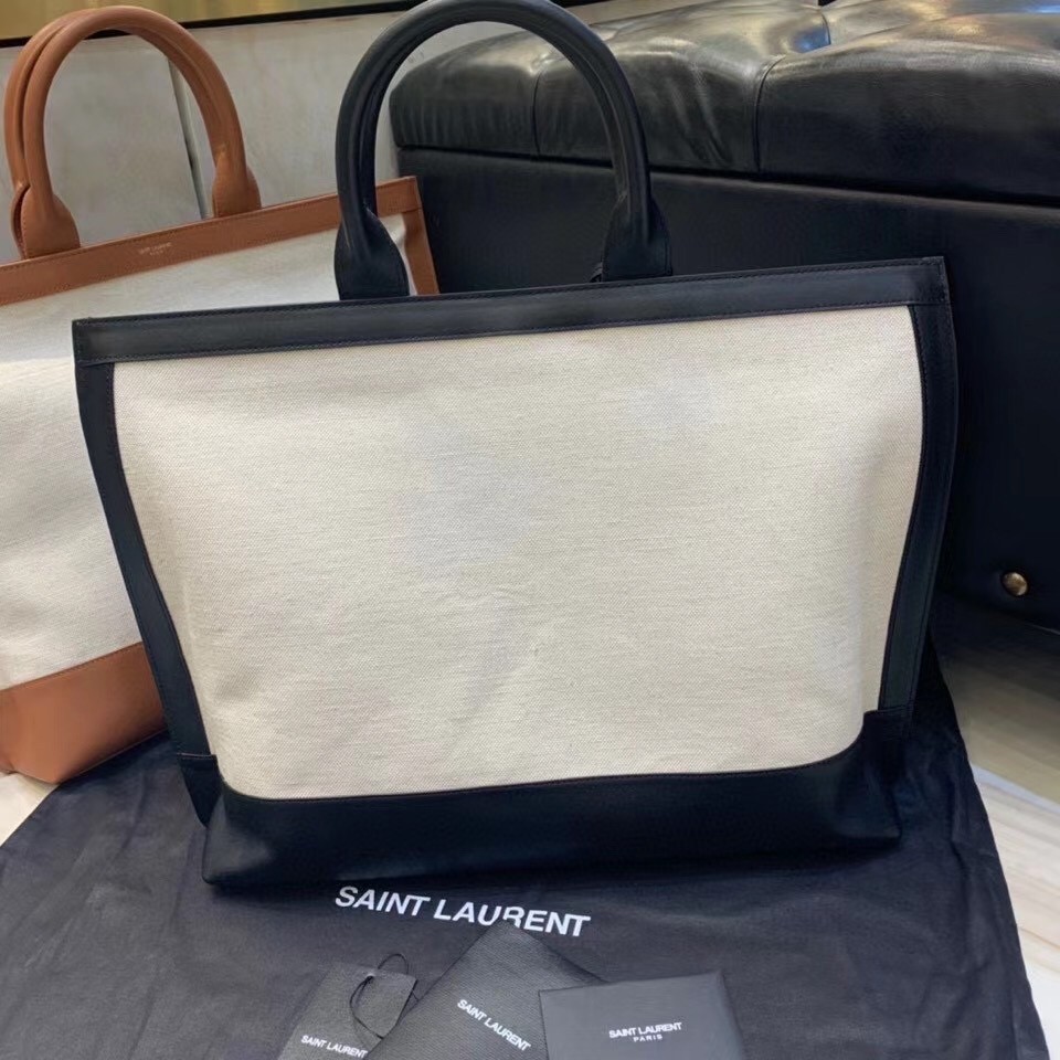 Sa**t Lau*nt tag shopping bag in canvas and black leather