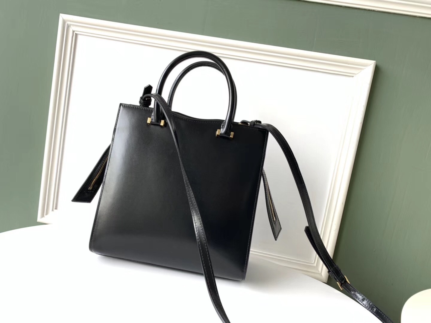 Sa**t Lau*nt small uptown tote in black calfskin