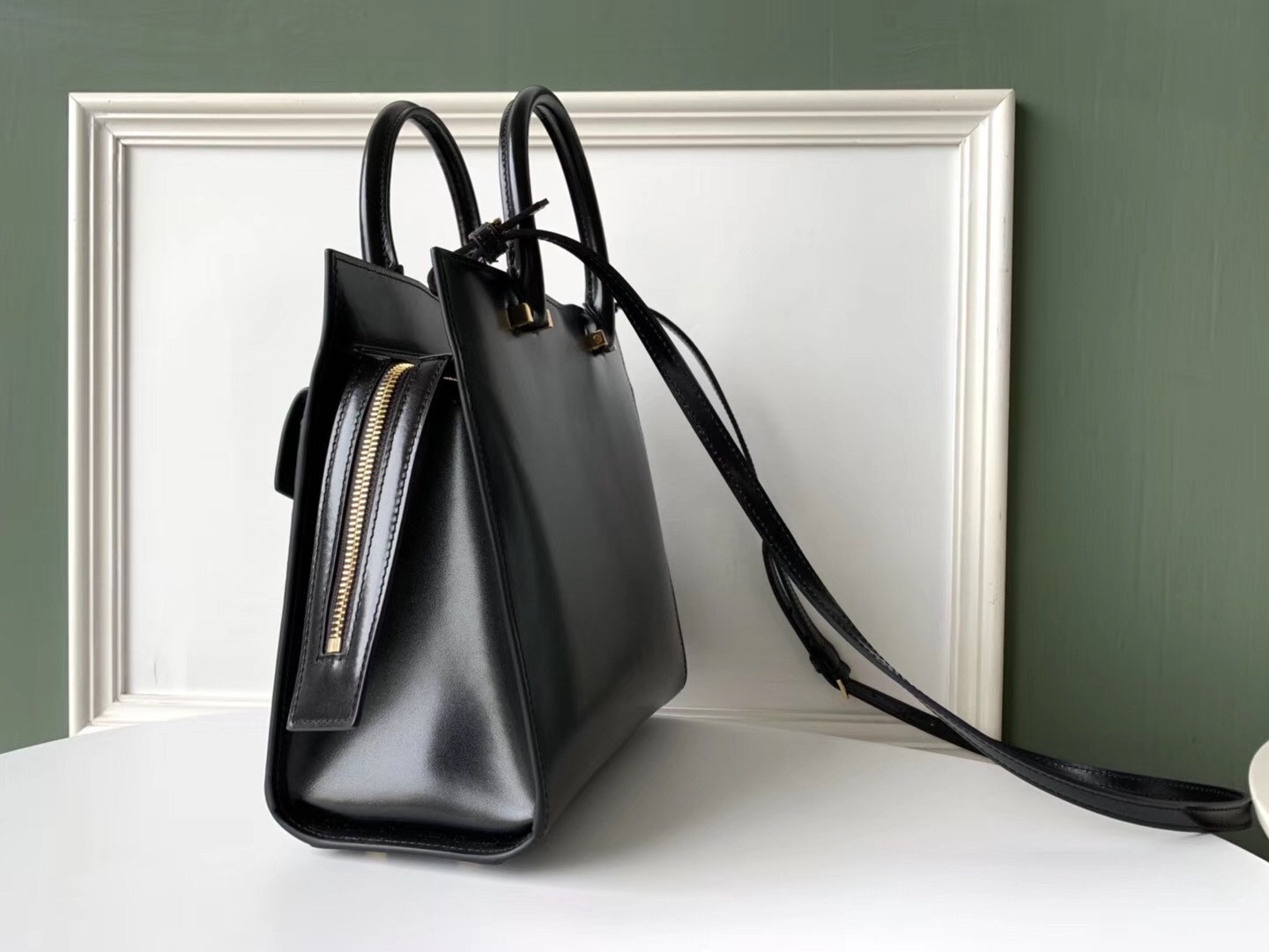 Sa**t Lau*nt small uptown tote in black calfskin