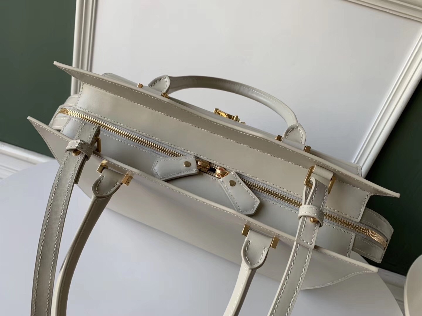Sa**t Lau*nt uptown medium tote in blanc calfskin