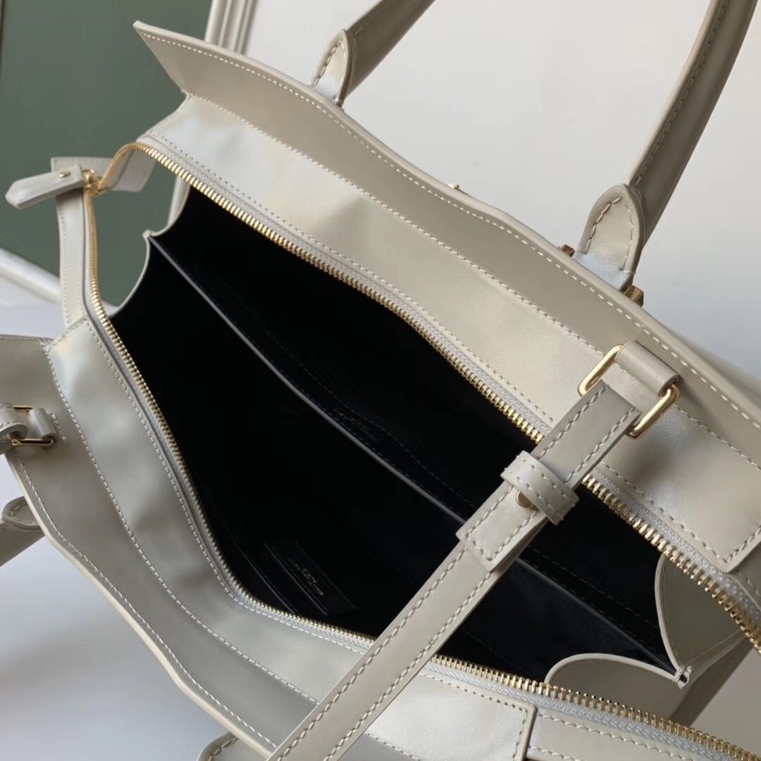 Sa**t Lau*nt uptown medium tote in blanc calfskin