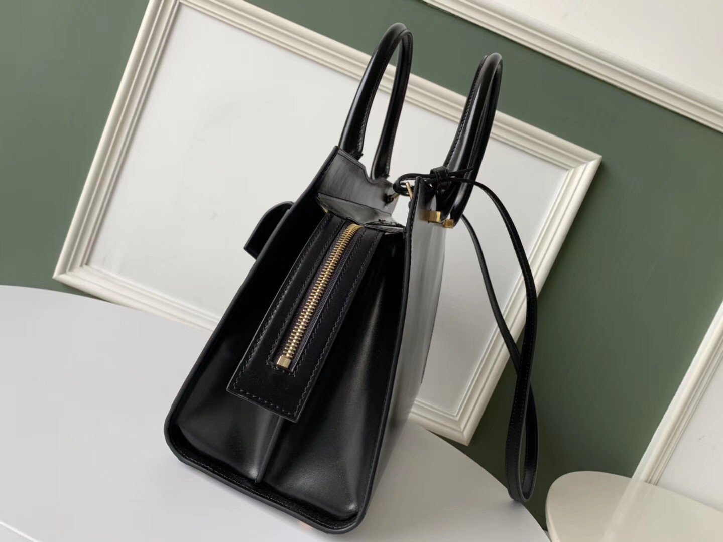 Sa**t Lau*nt uptown medium tote in black calfskin
