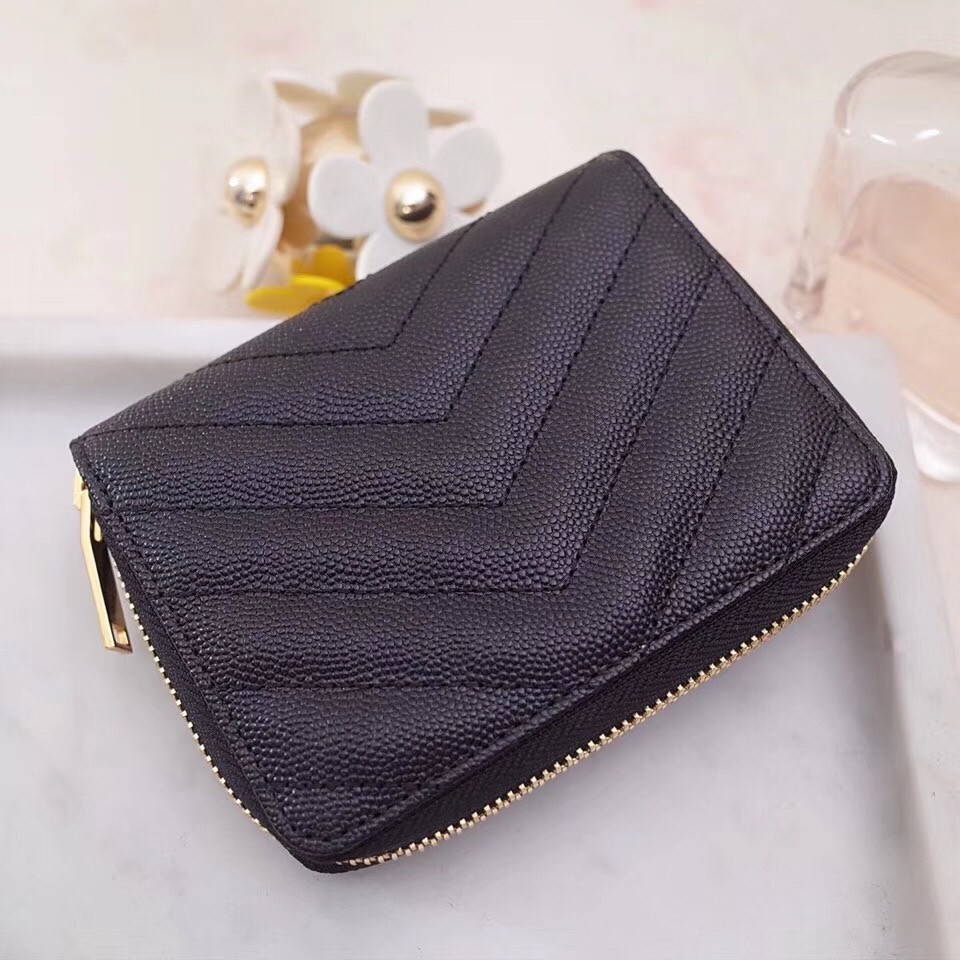 Sa**t Lau*nt compact zip around wallet in black leather