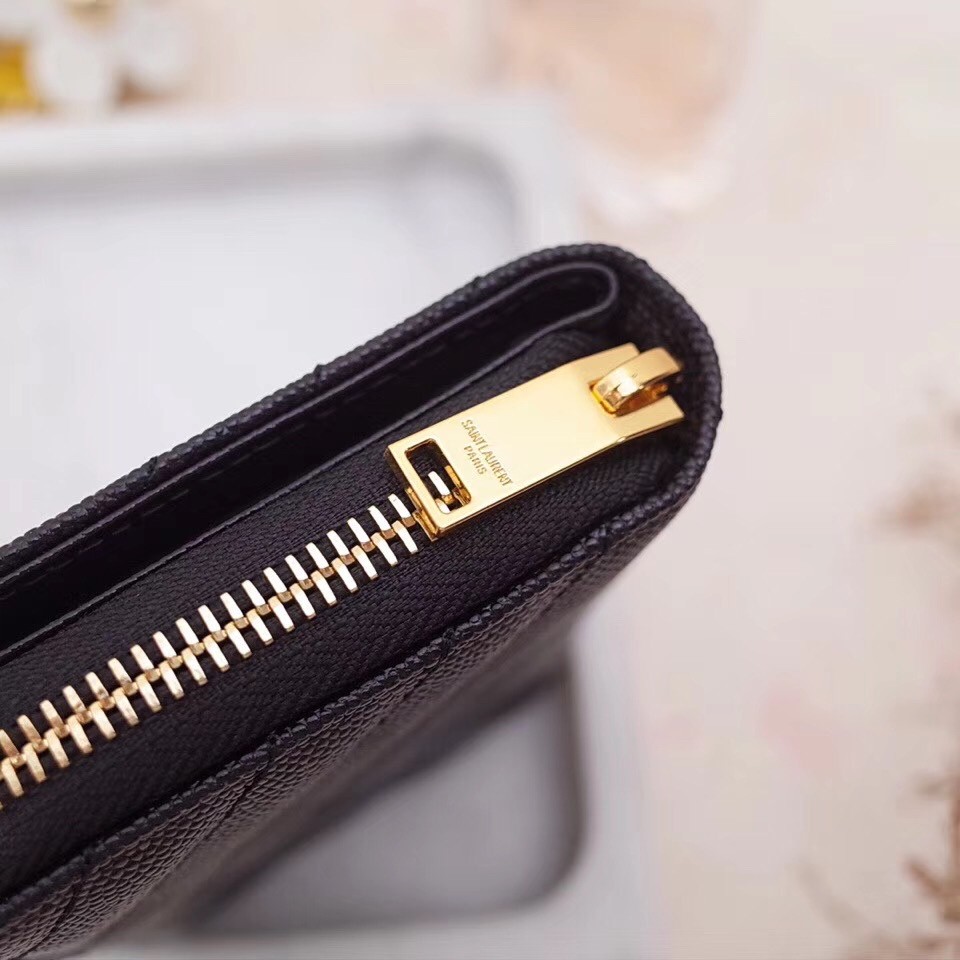 Sa**t Lau*nt compact zip around wallet in black leather
